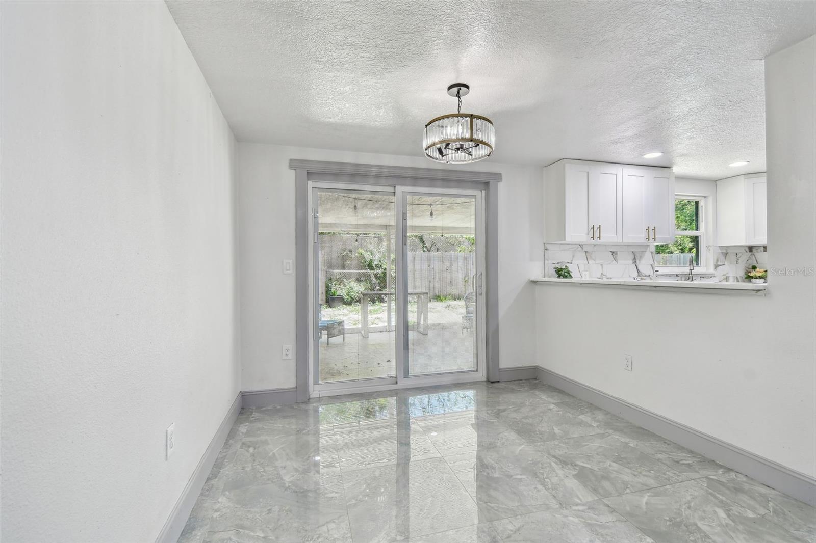Sliding glass door to outside area