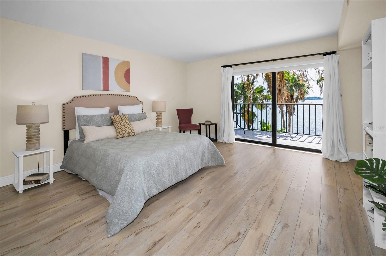 Primary Bedroom with sliders to balcony