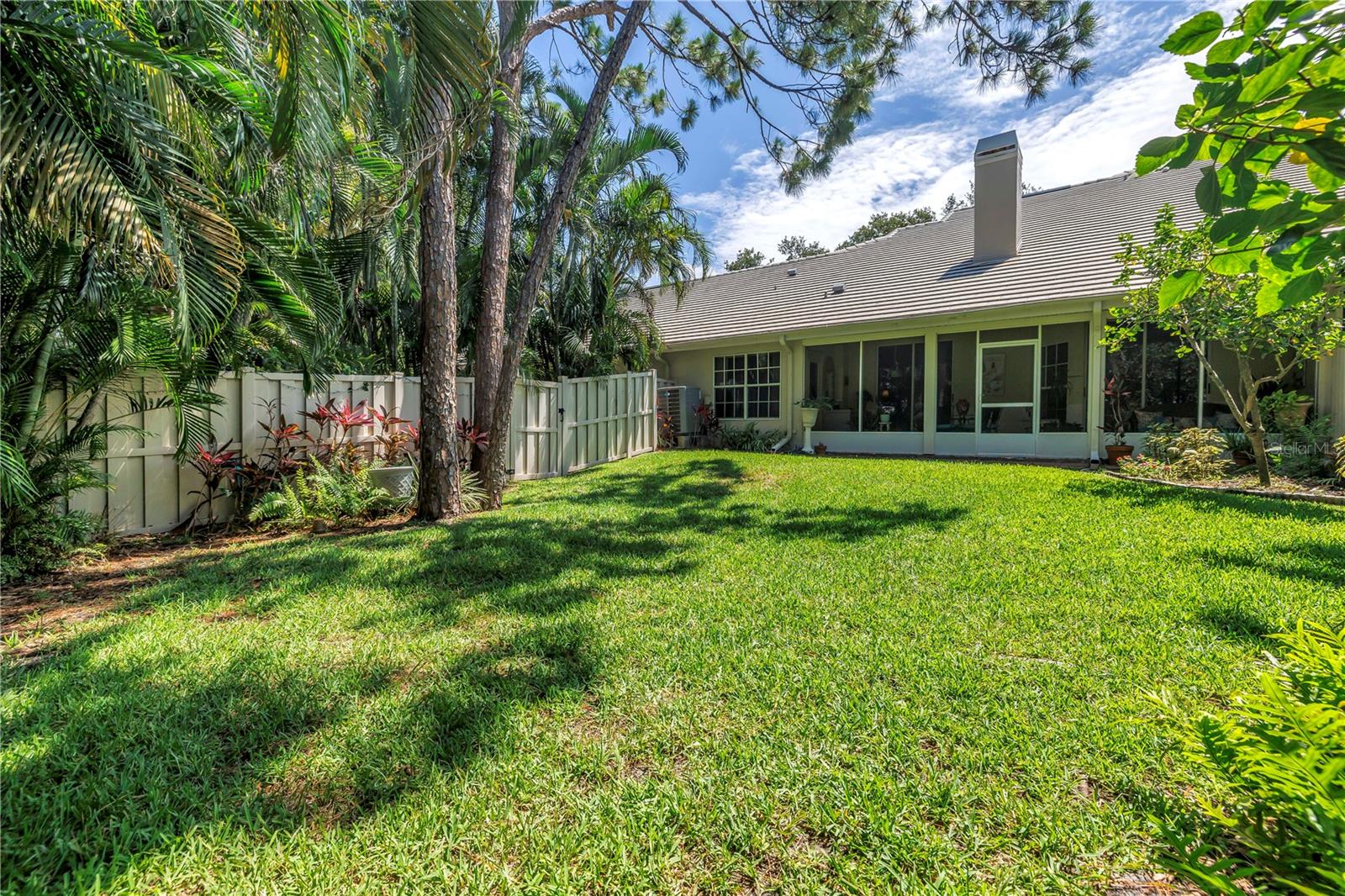 A long look back at the Screened Porch from the end of the yard