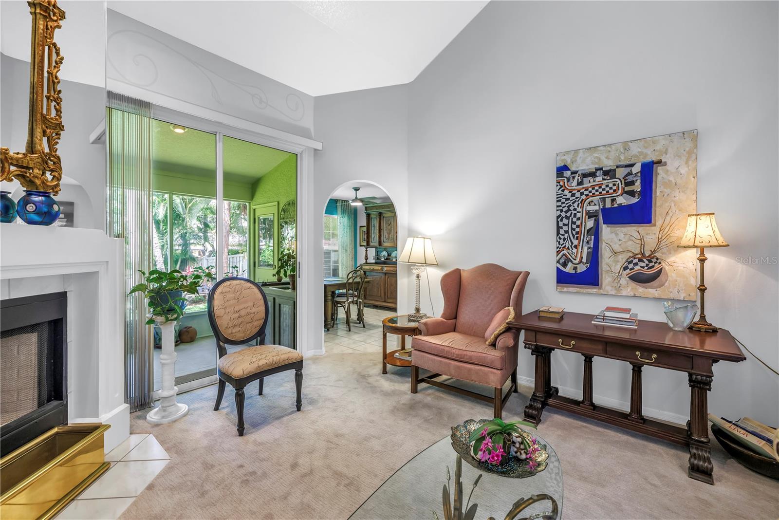 Living Room with 8-Ft Sliders to the screened porch and private yard