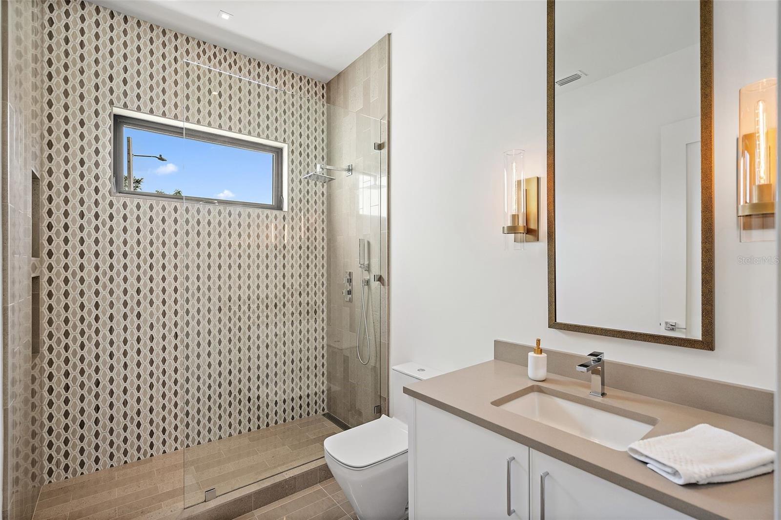 Bedroom 2's en suite Bath