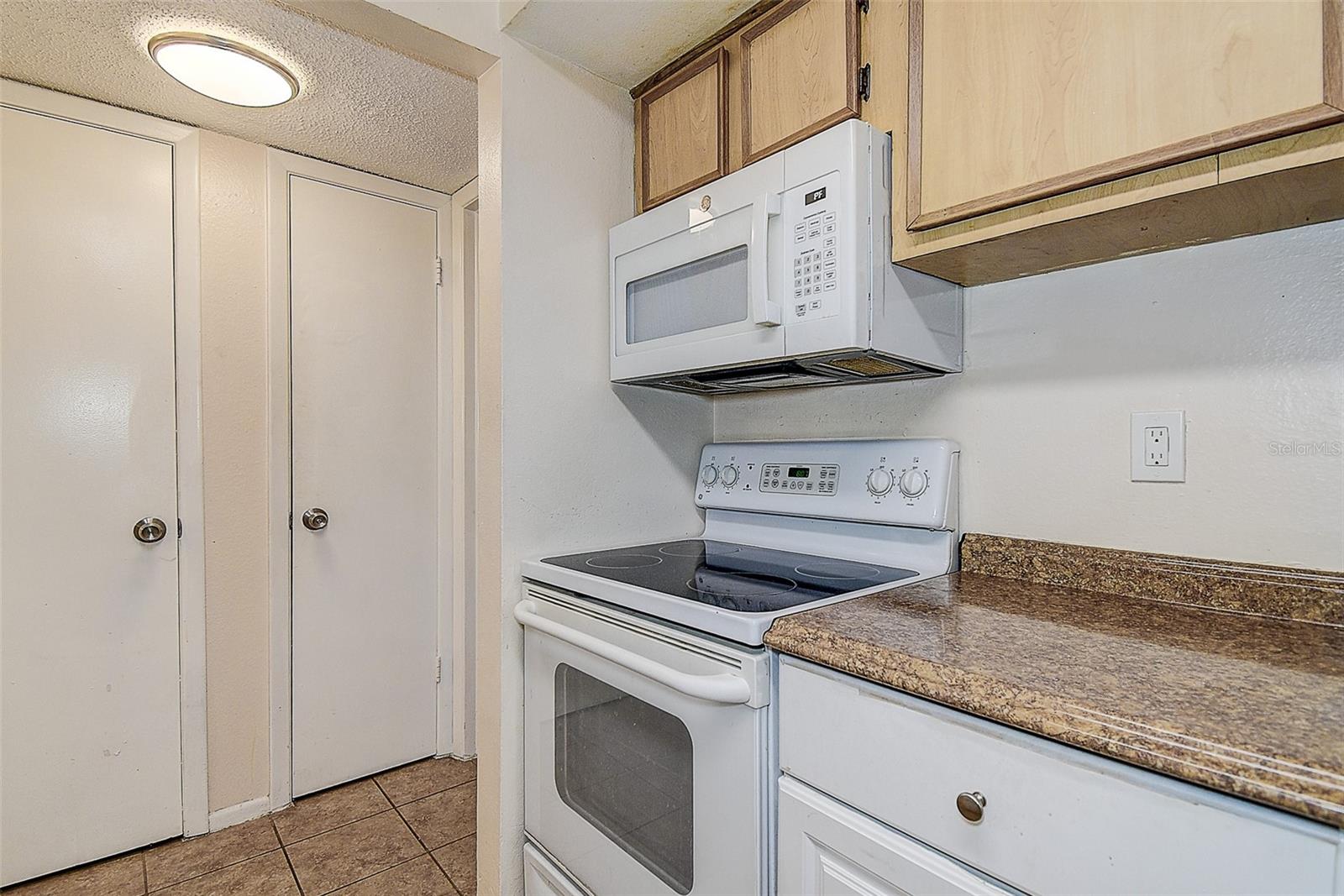 Left door is utility  room.  Right door is pantry and additional storage