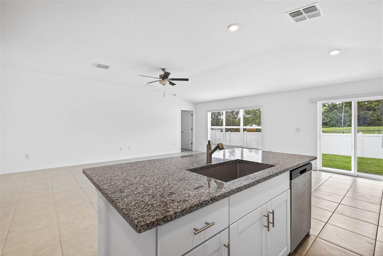 Stay connected to your living space with views toward the living room