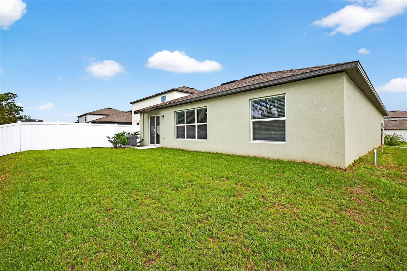 Extend your patio, close in the fence, add a screened lanai- this outdoor space is great!