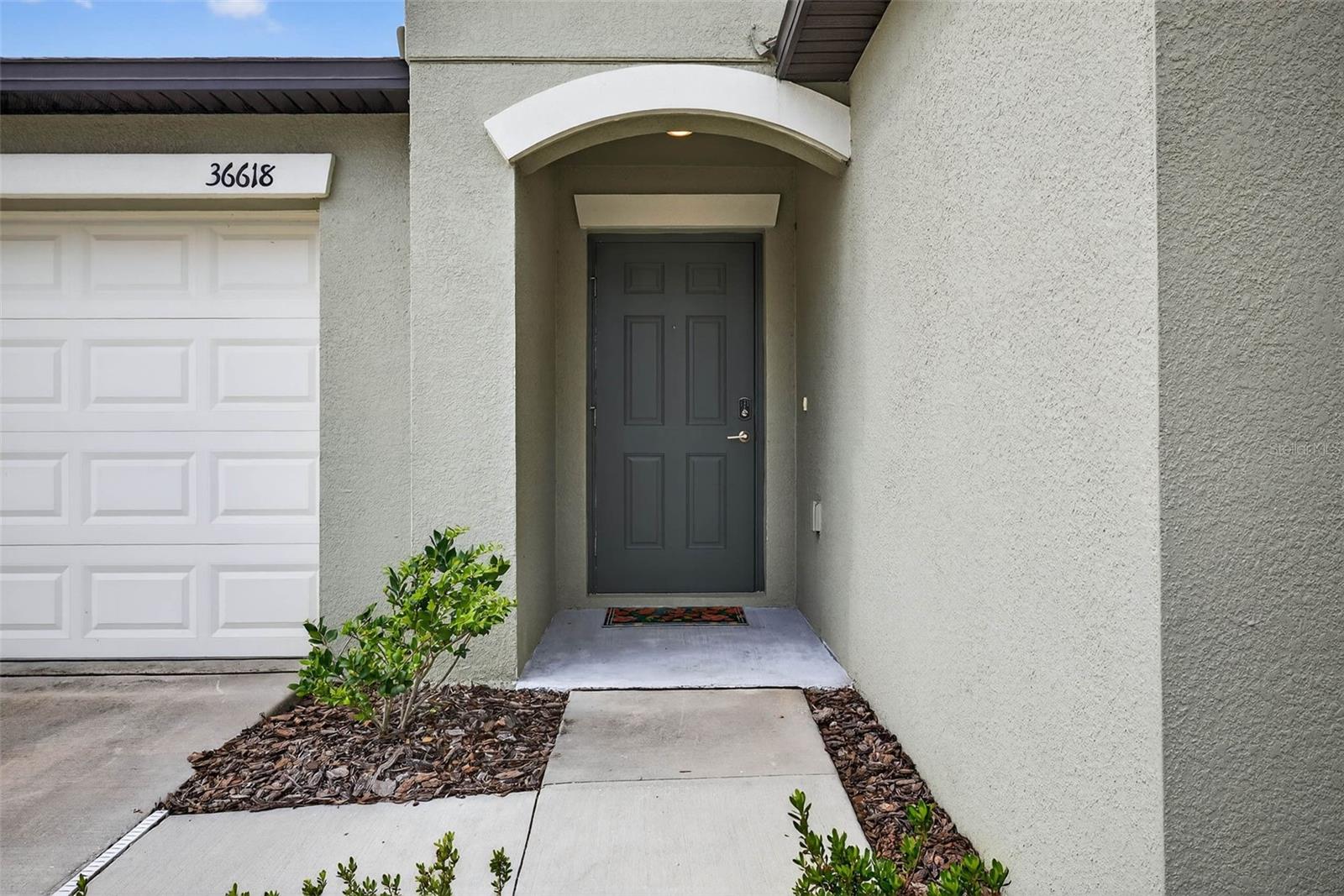 Welcoming entryway with 2 car garage entry as well.
