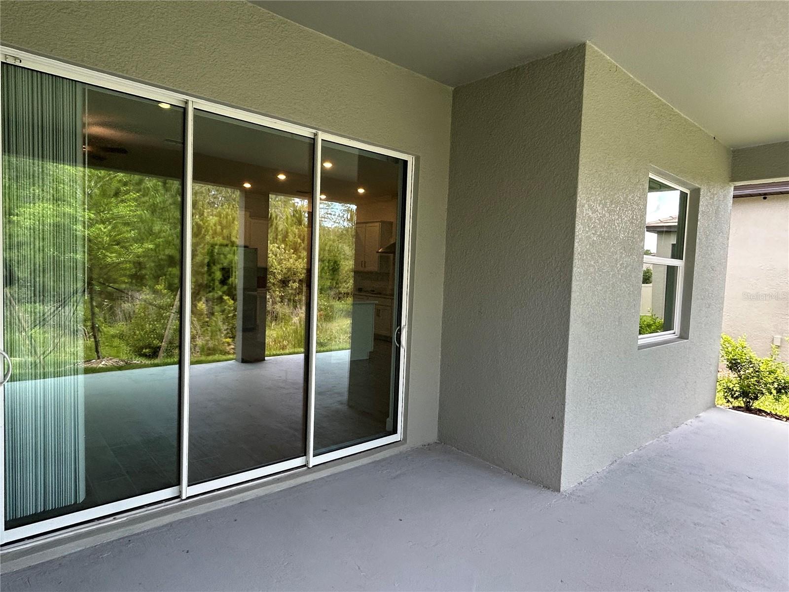 Double Sliding Glass Doors to Lanai Area, (TO BE SCREENED IN)