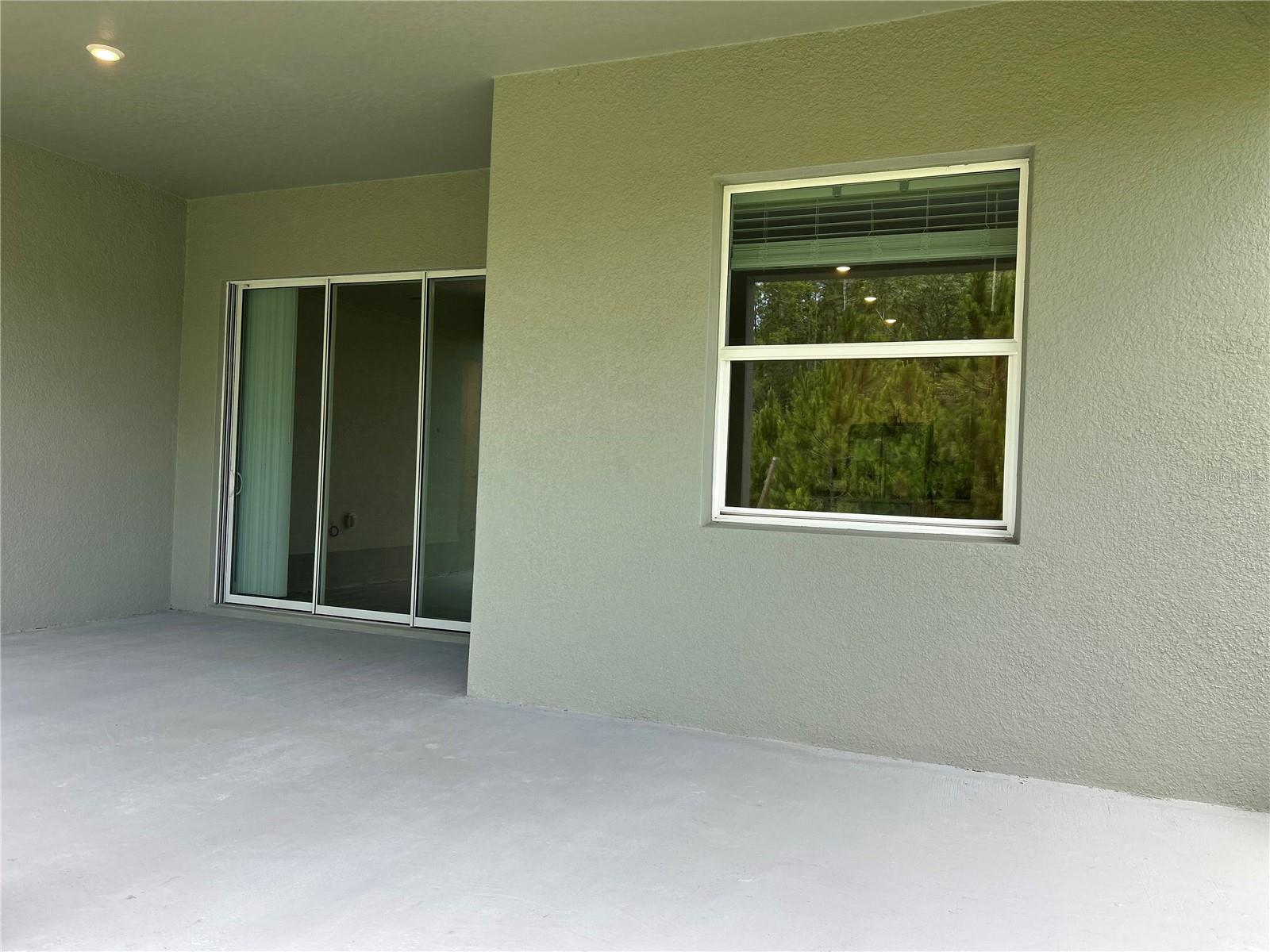Window (Dining Area) and Large Lanai Area ( to be screened)