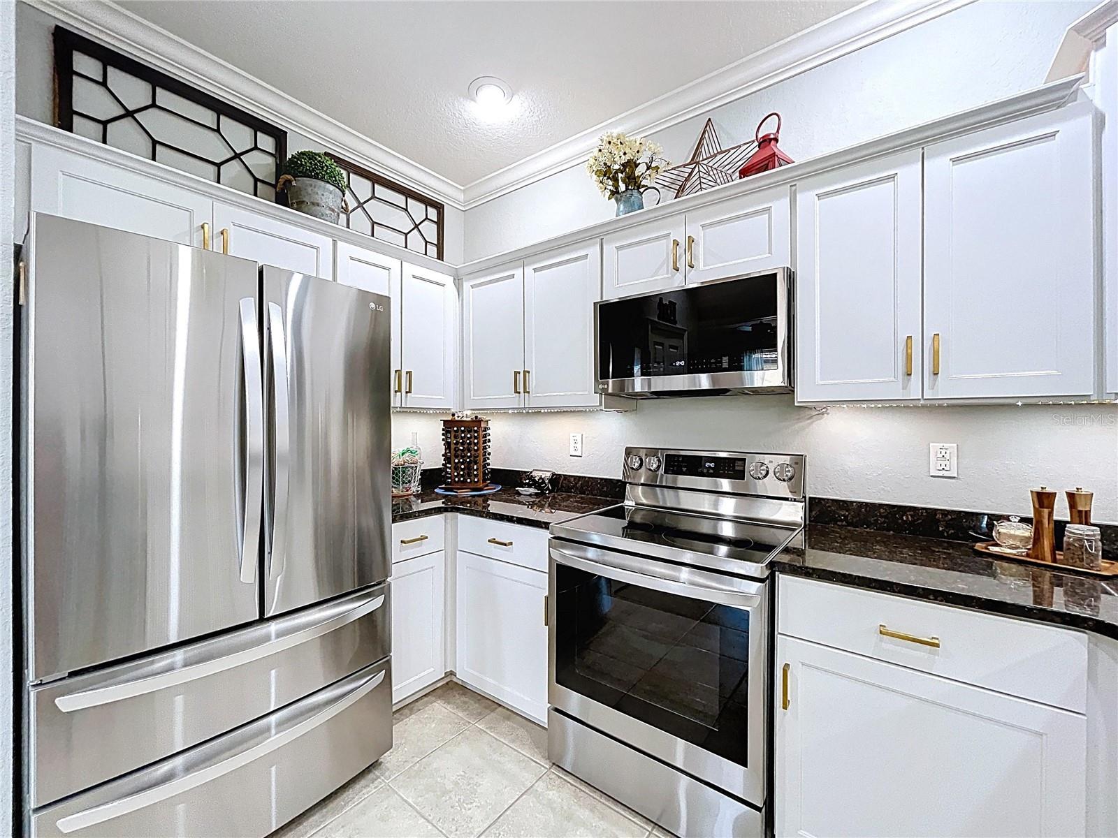 Kitchen with updated appliances ~ Refrigerator 2022