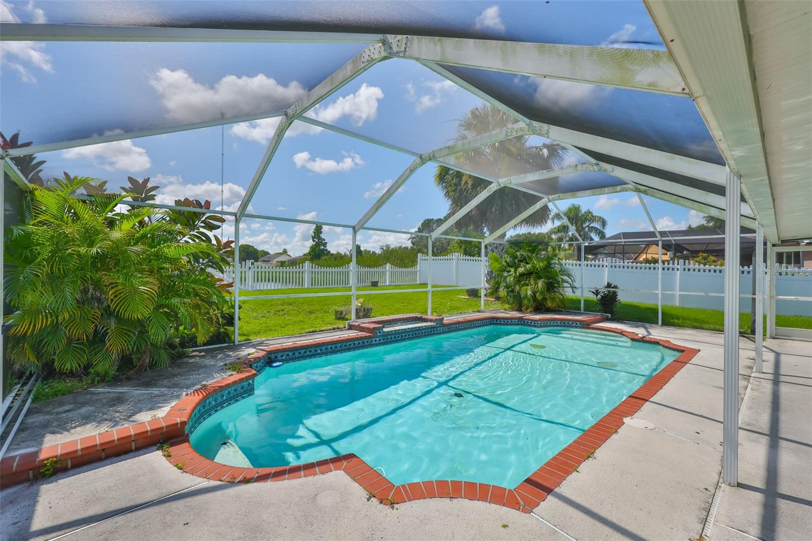 Pool, garden, waterfall, lanai - paradise!