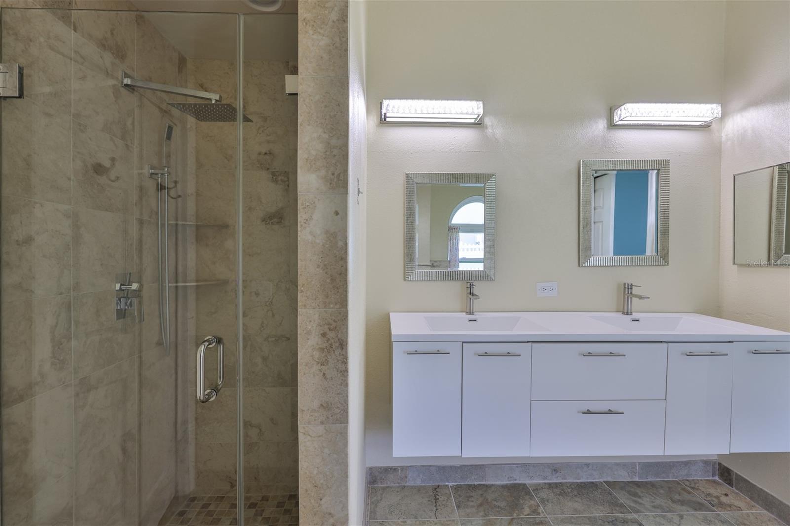 Stall shower, dual vanities