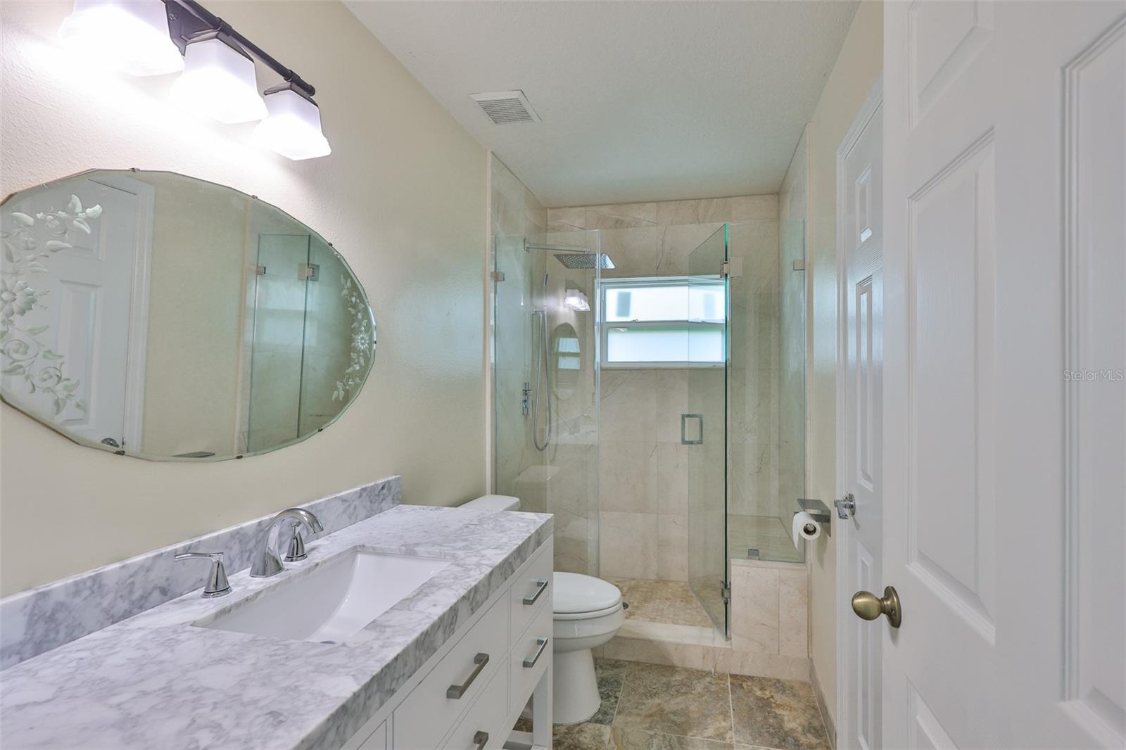 Bathroom 2 between bedrooms 2 and 3. All new, rain shower, shower bench, vanity