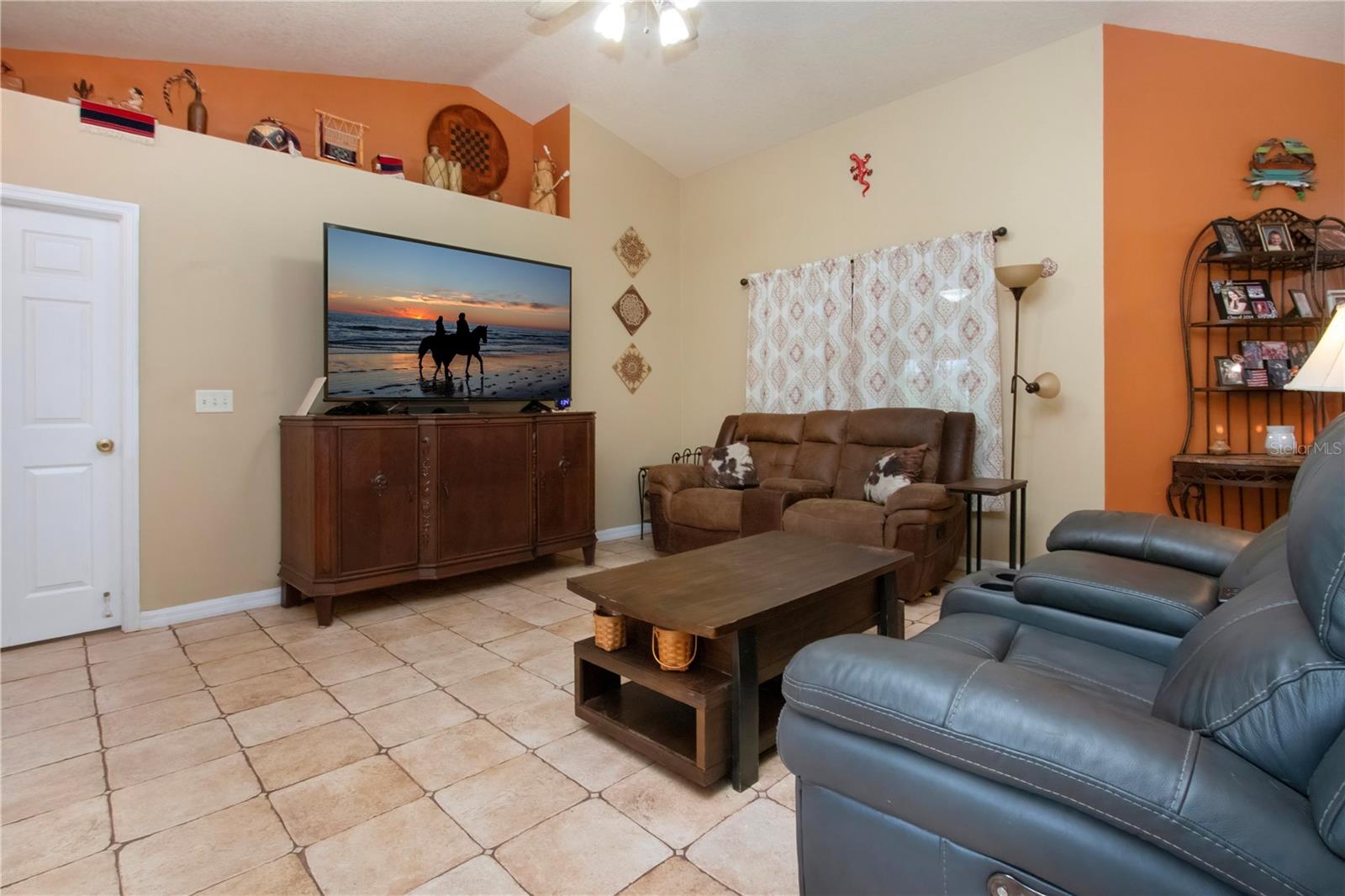Living room has high ceilings
