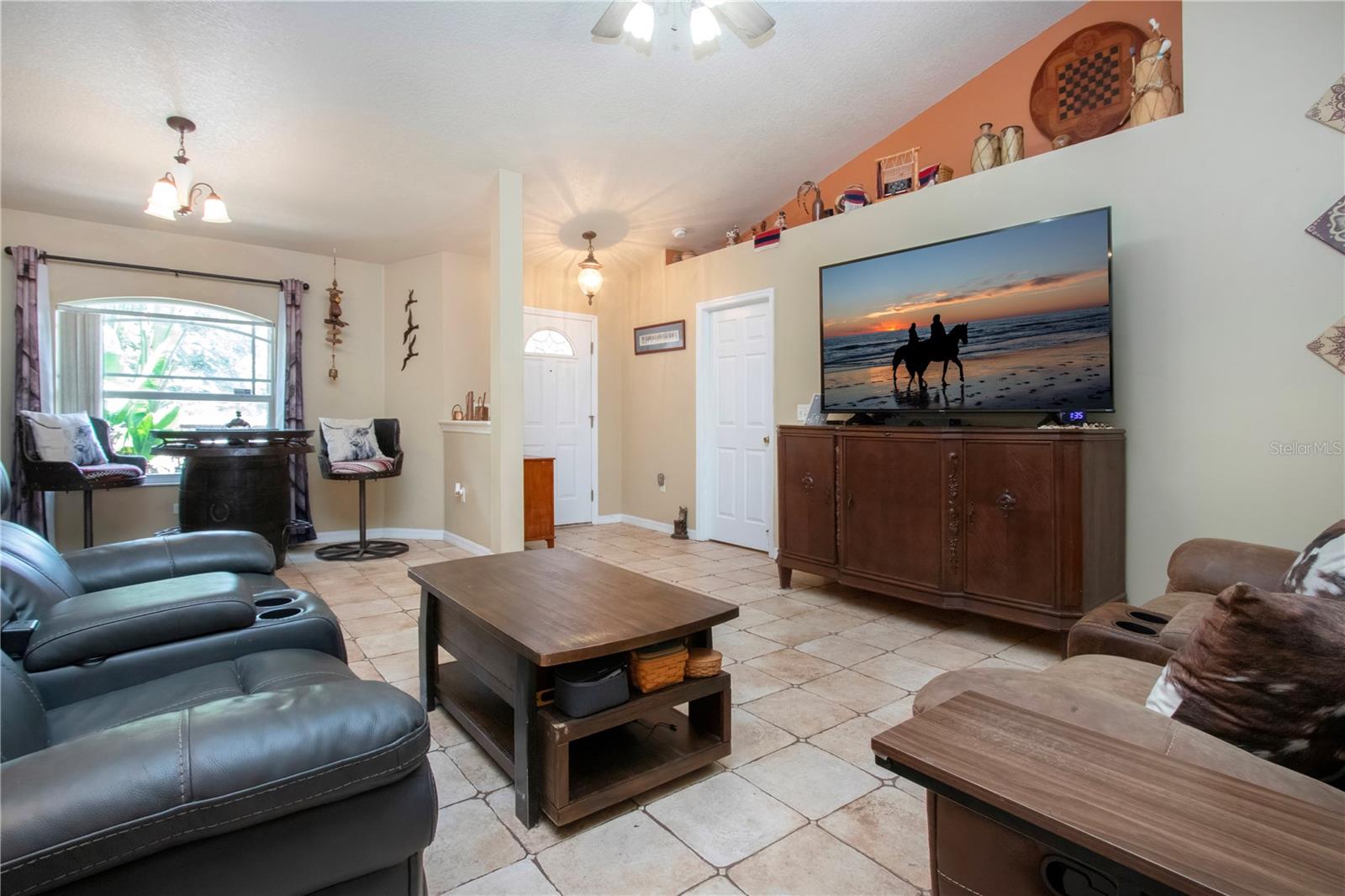 Living room with view of the dining room
