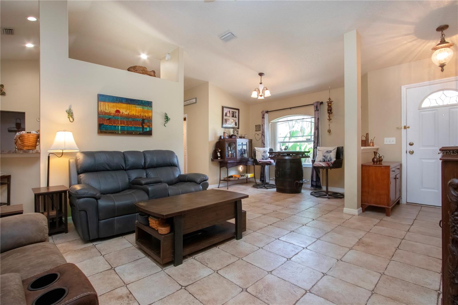Living room with view of dining room