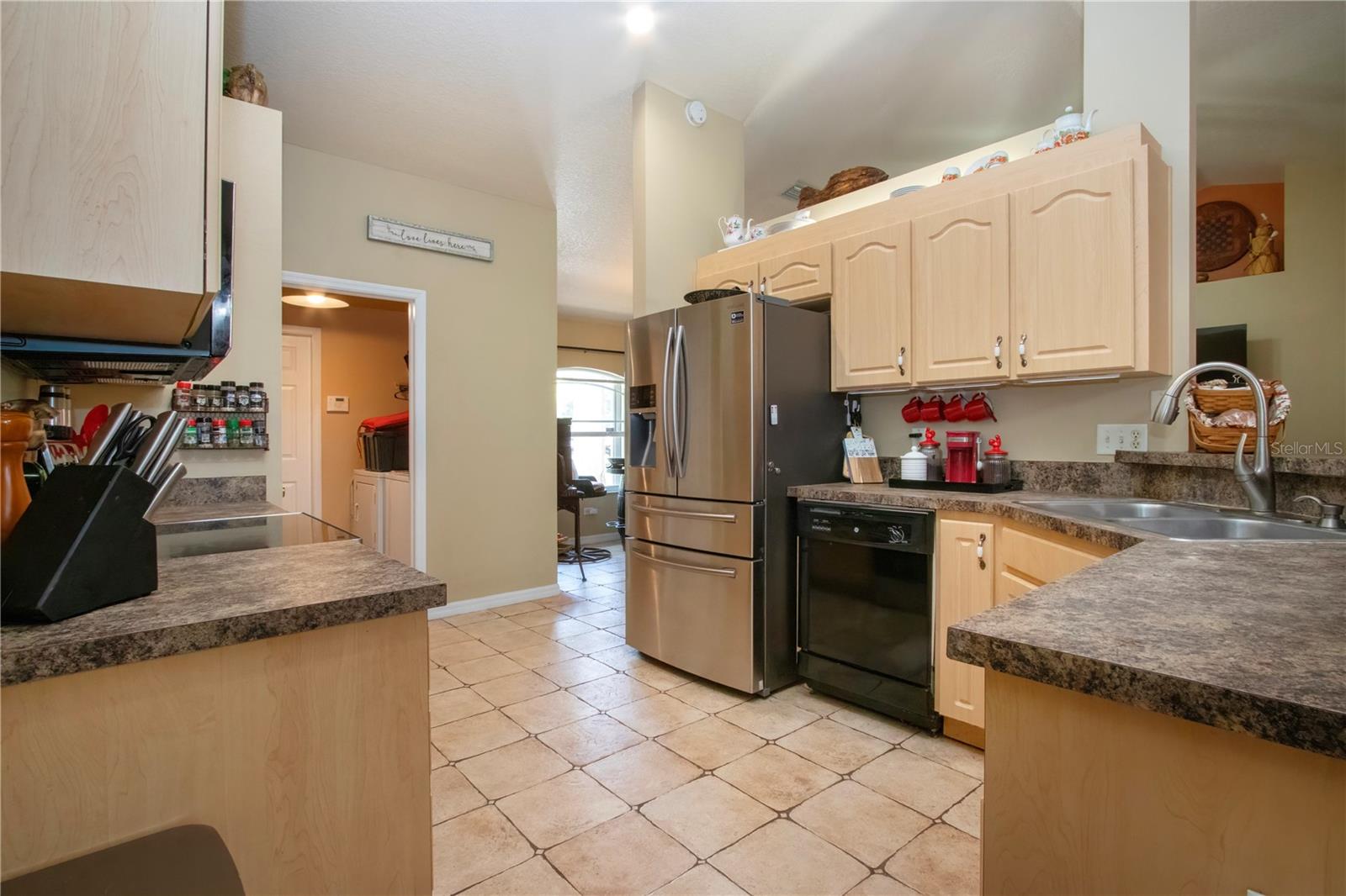 Kitchen with view to the laundry room