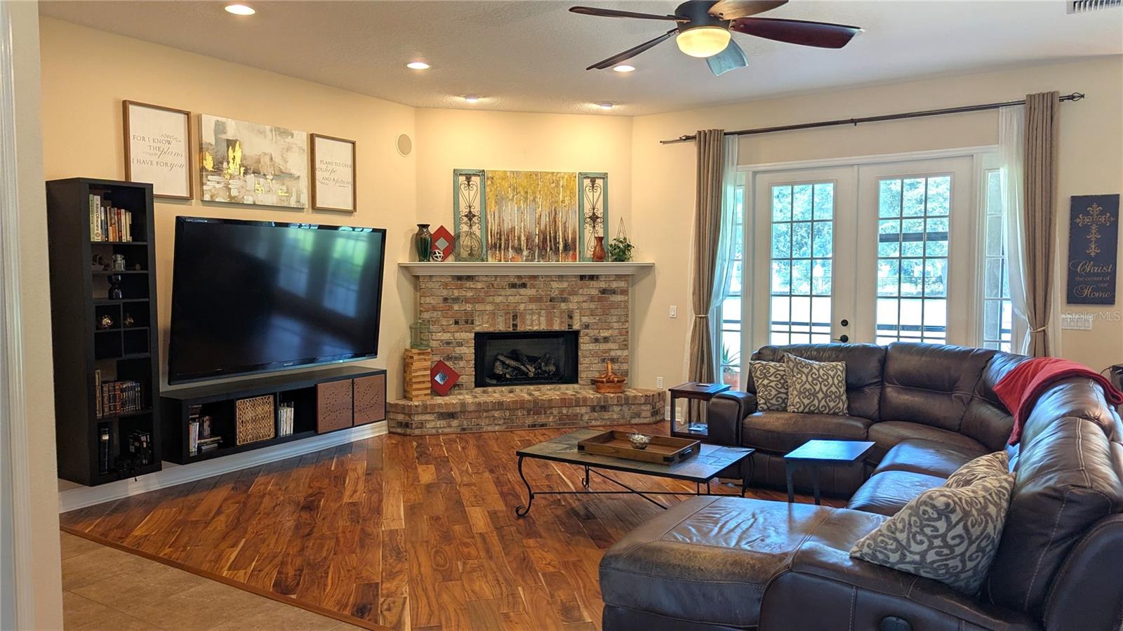 Lovely living room with gas fireplace.