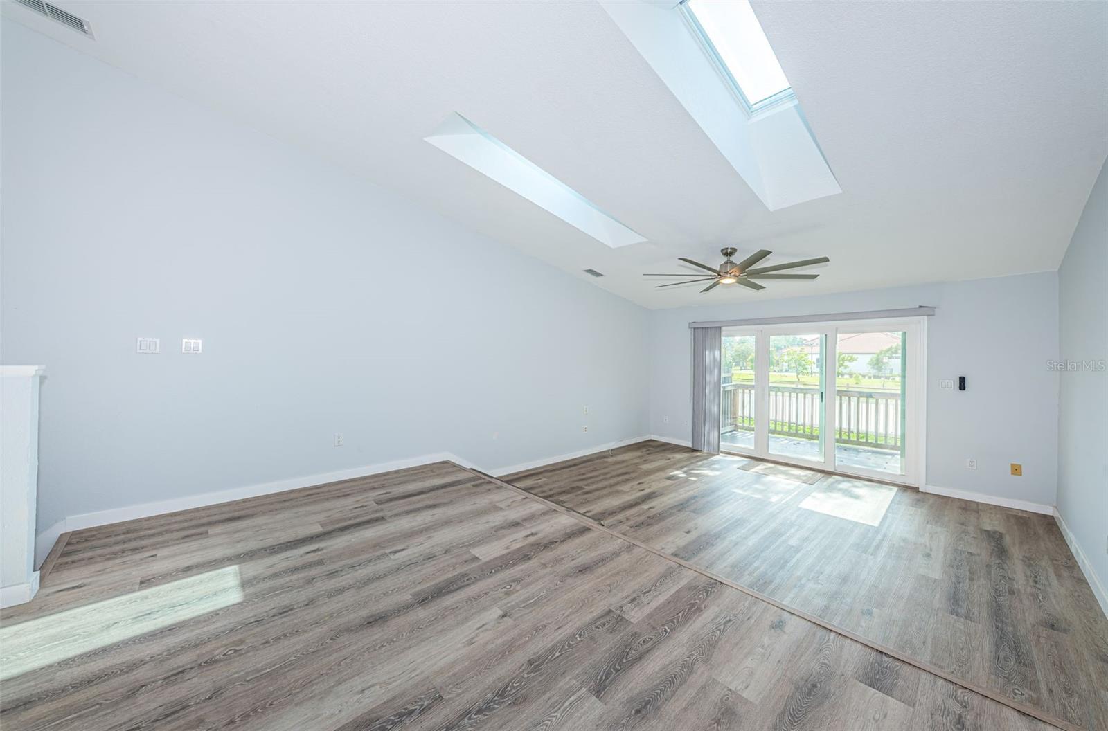 Dining area, great room & slider to rear porch