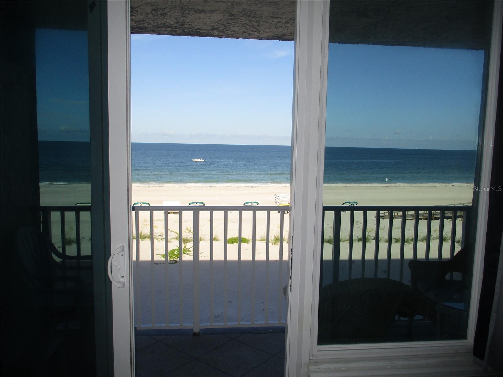 Newer Double Pane Sliding doors leading out to your private balcony and looking out to the Gulf.