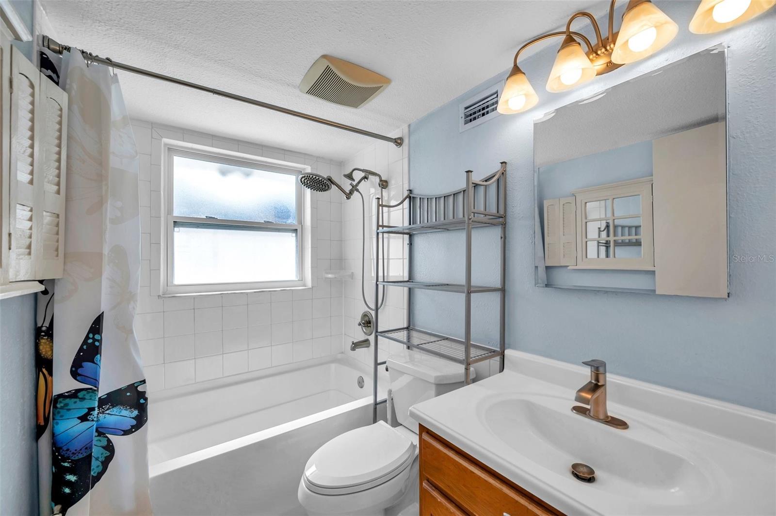 One bathroom has a tub/shower combination.