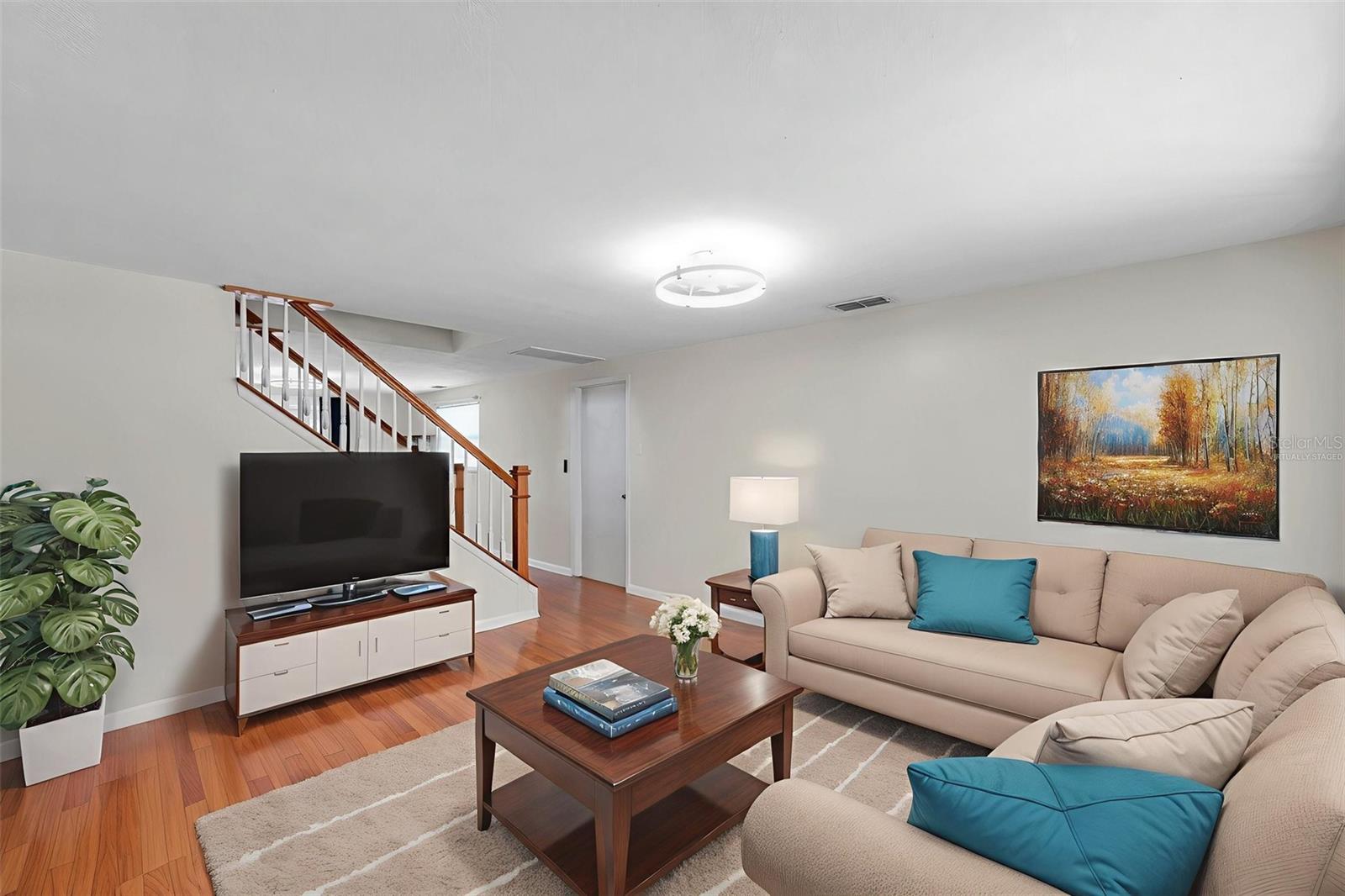 Front room virtually staged.