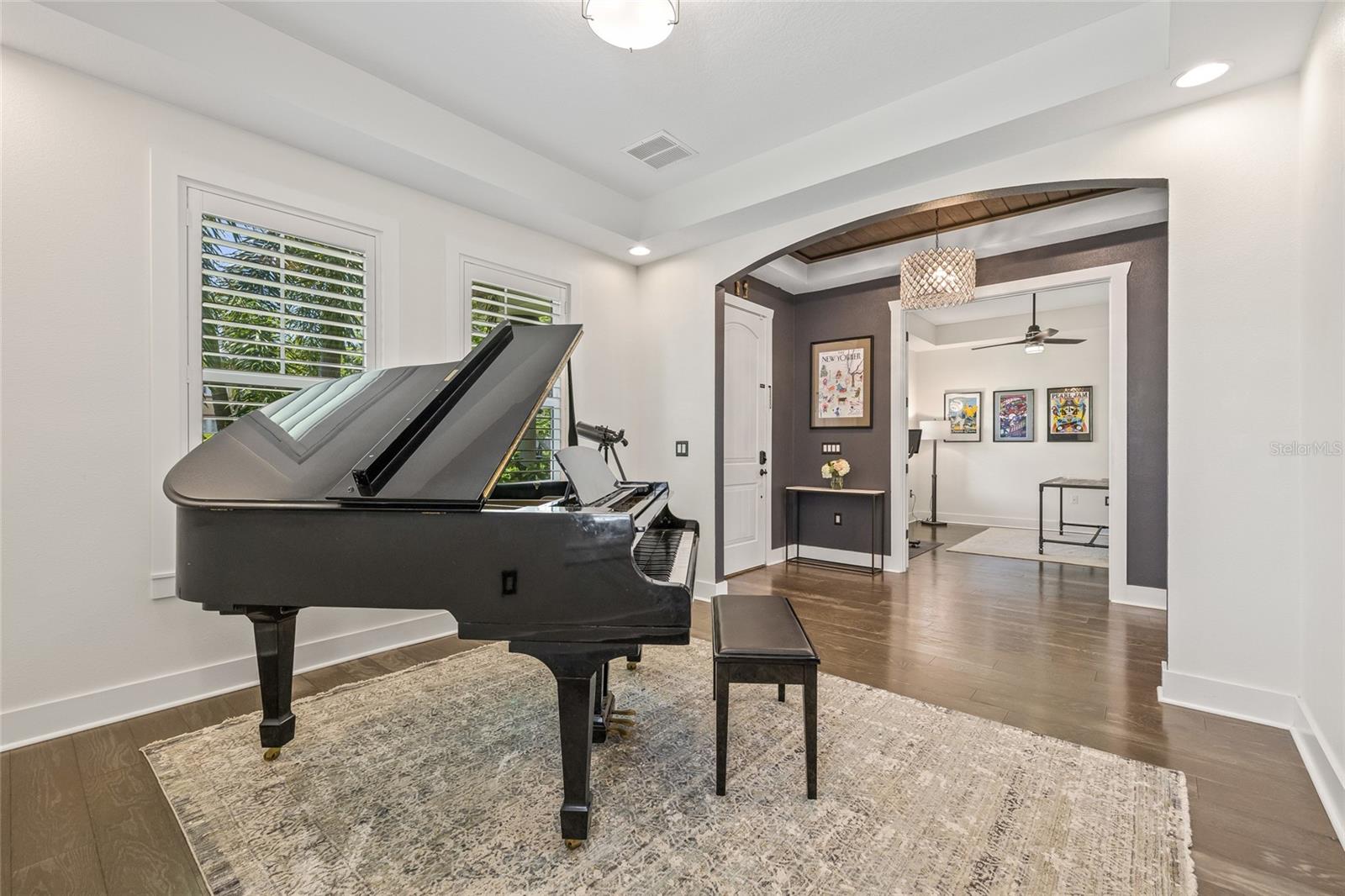 Front dining room is so versatile - the current owners use it as their music room.