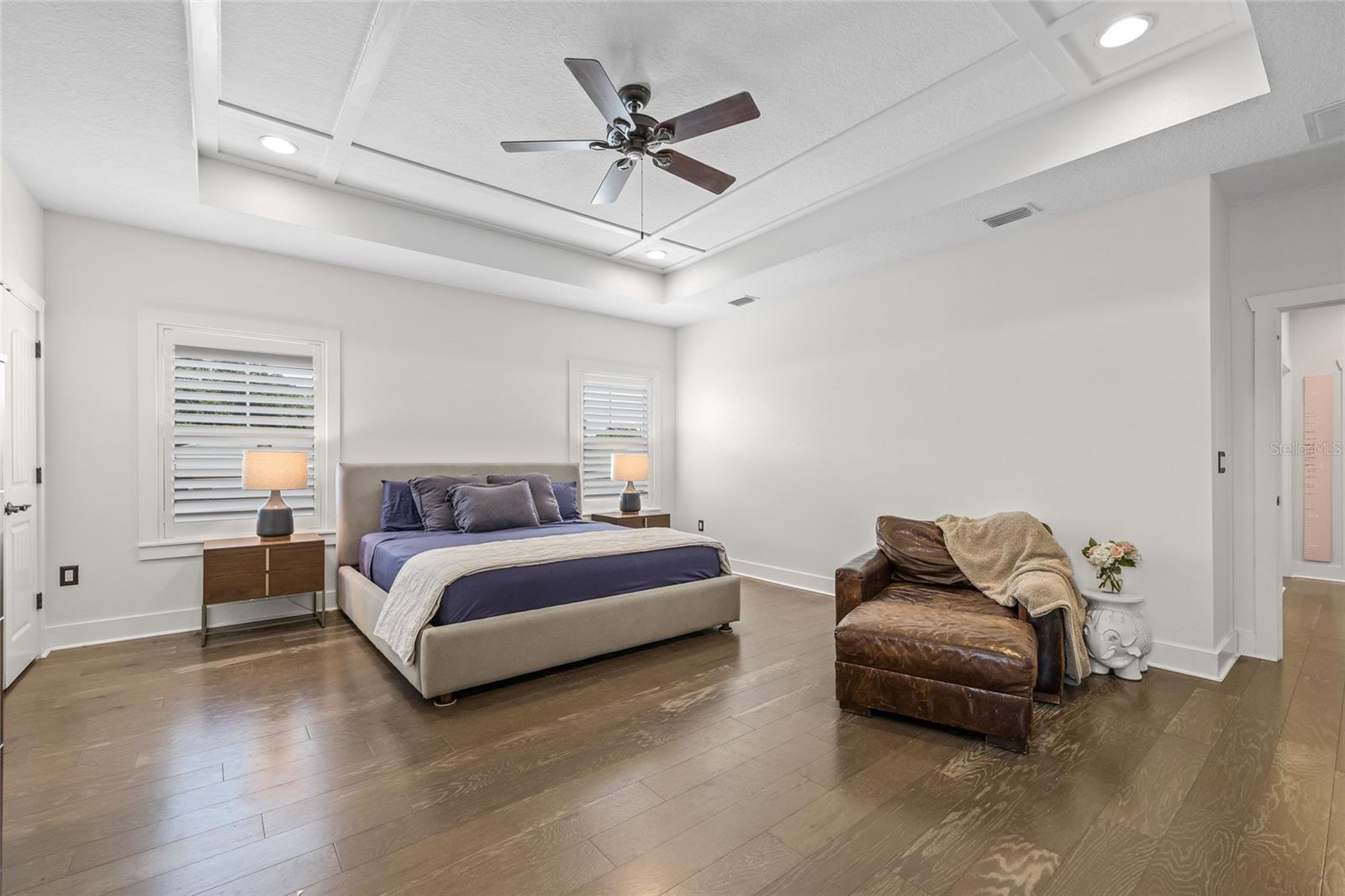 Travel upstairs to the spacious primary suite.