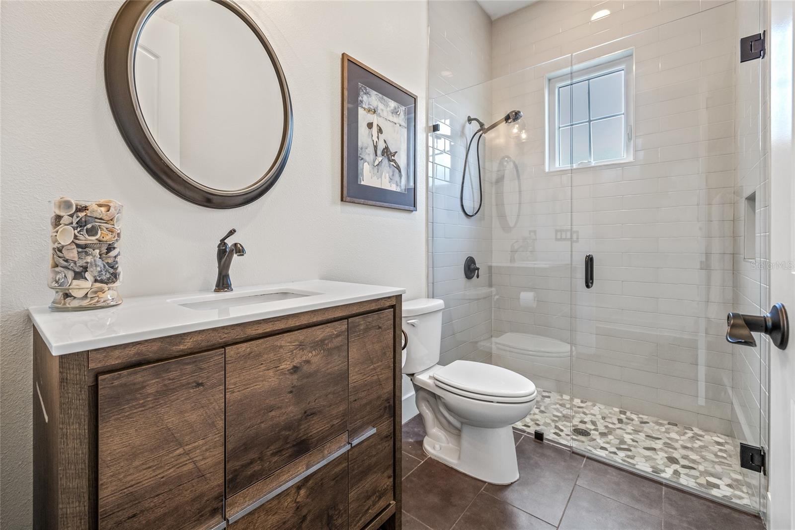 Full downstairs bathroom also serves as the pool bath.