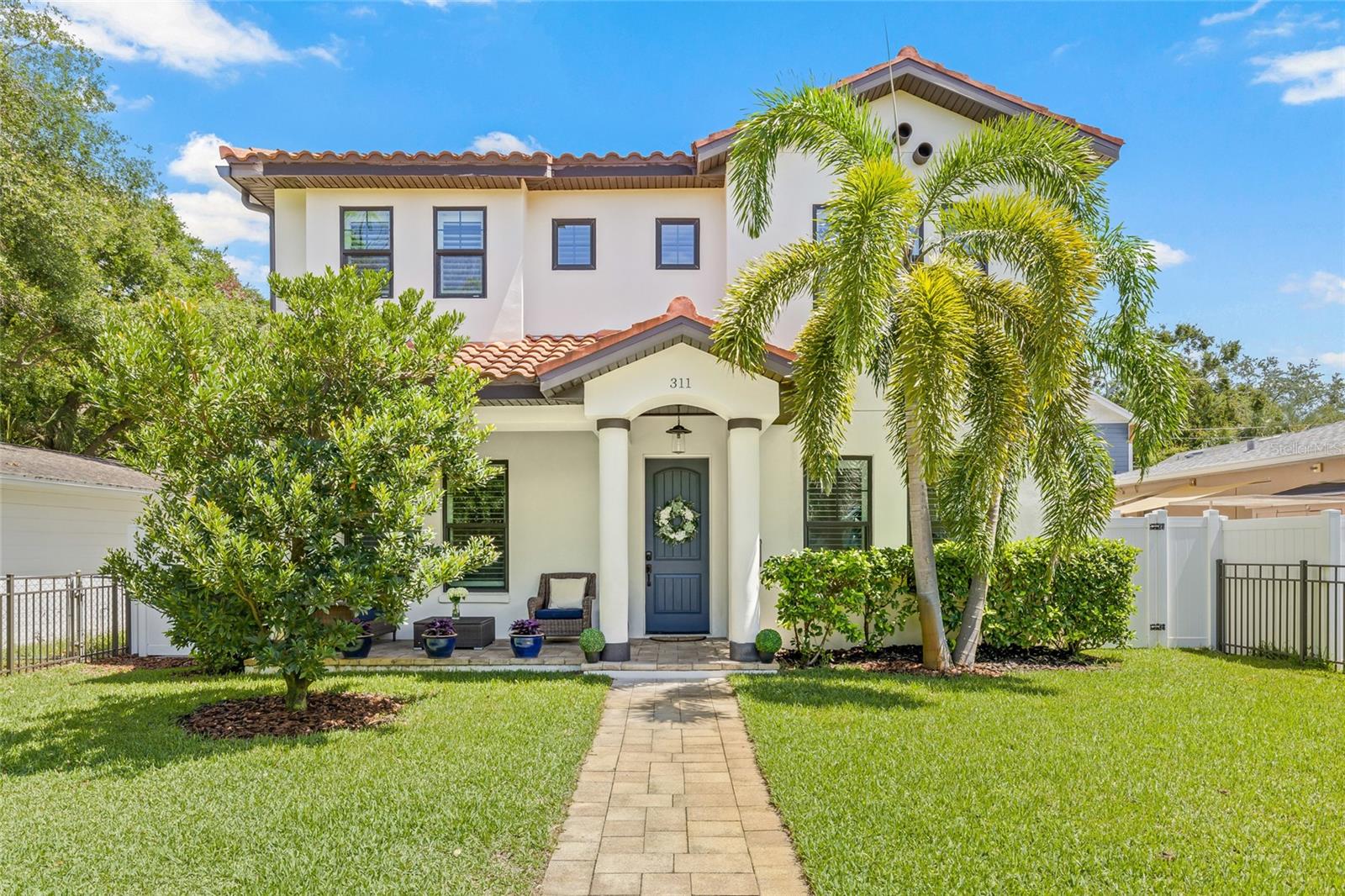 Fully fenced front yard.