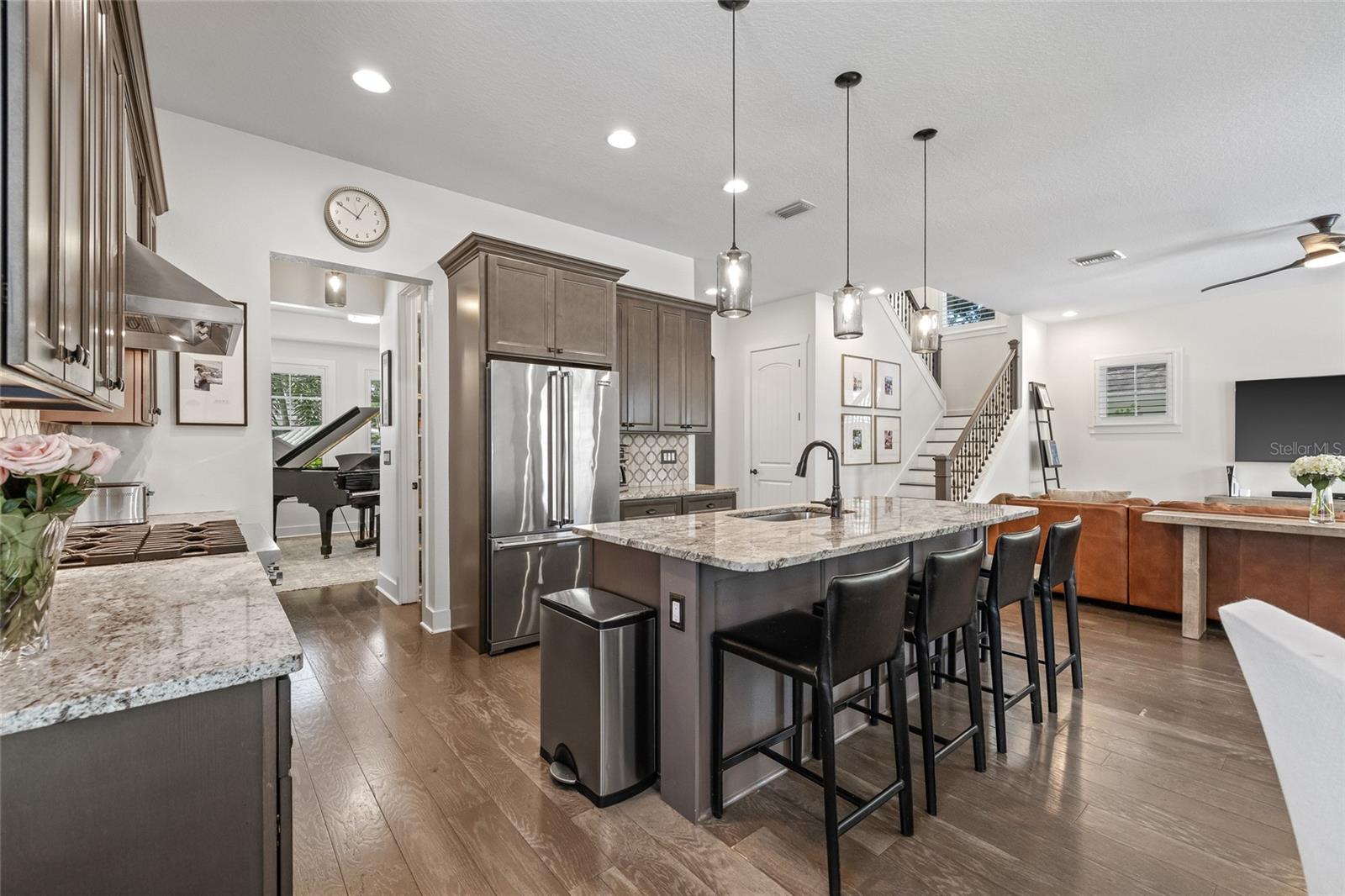 Flowing from the kitchen to the dining room, perfect space to mingle and dine.