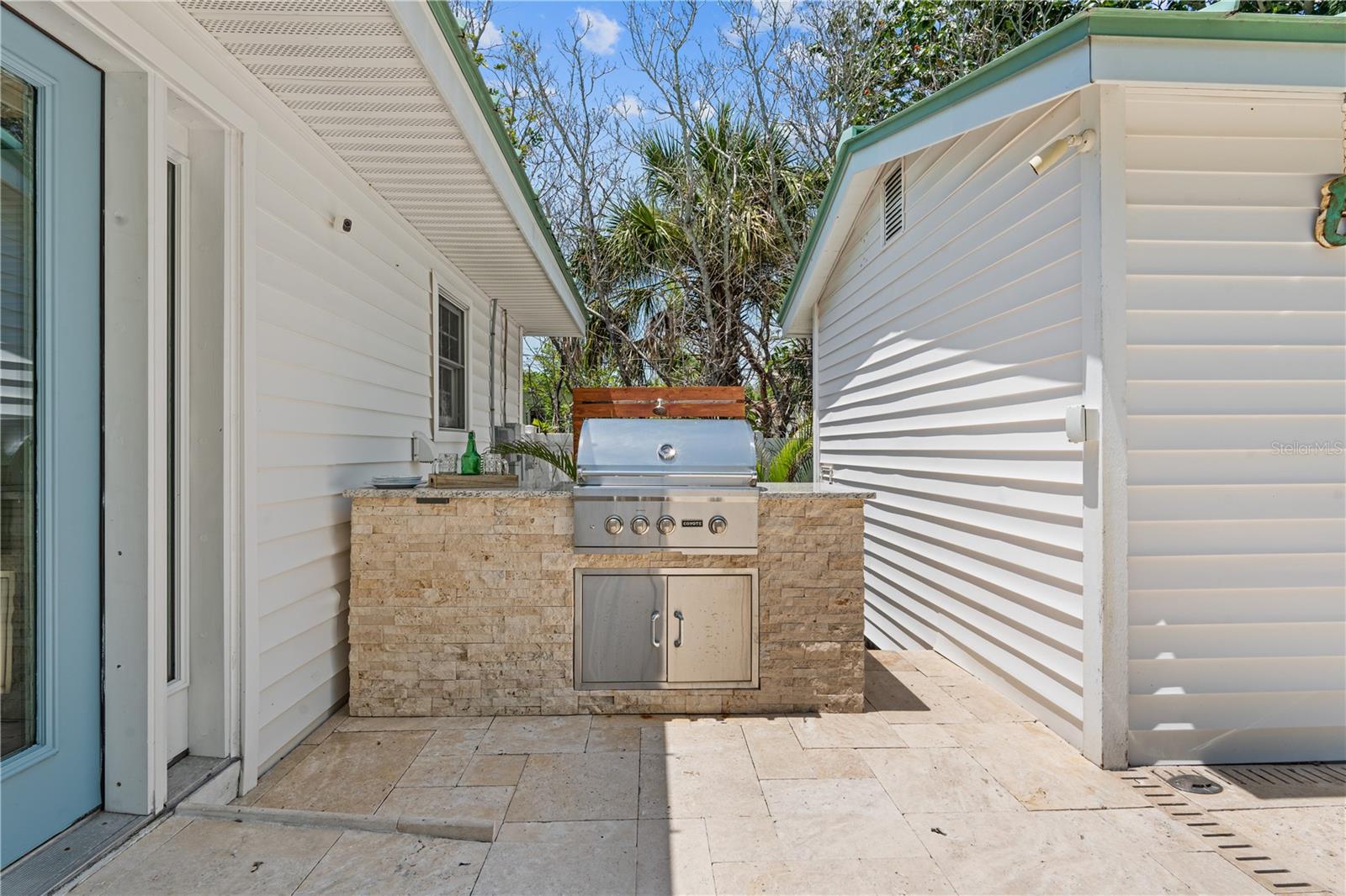 Love entertaining?  Bar-b-q up those delicious meals outdoors with this built in BBQ.  Located between the main house and the guest house
