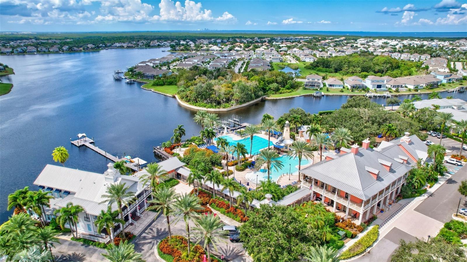 Rear View of Clubhouse & Community Pool from Lagoon
