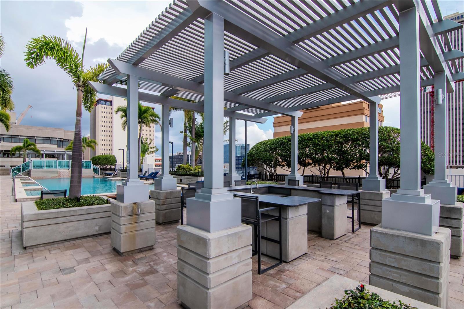 Pergola and Grilling Area and Pool View