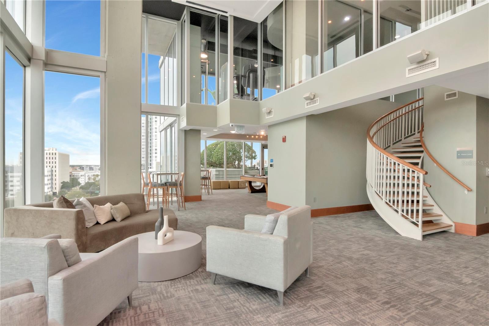 Community Seating Area, Staircase, and View of Gym 2nd Floor