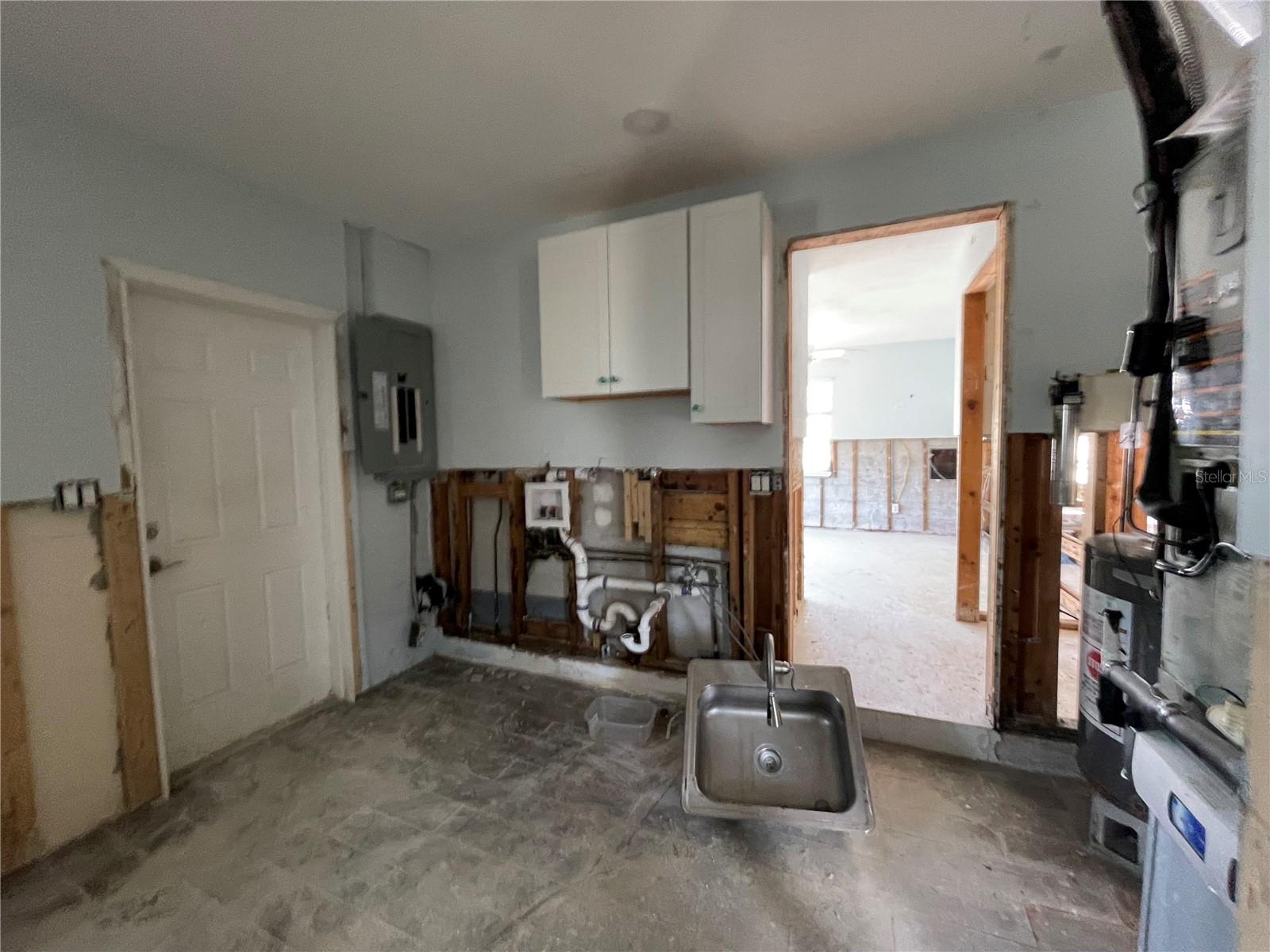 Garage area that has been converted into living space.