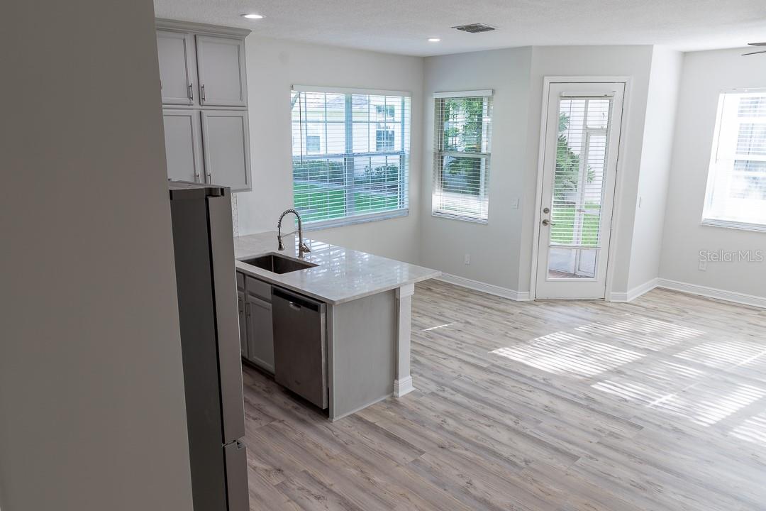 Stairview of kitchen and dinette area