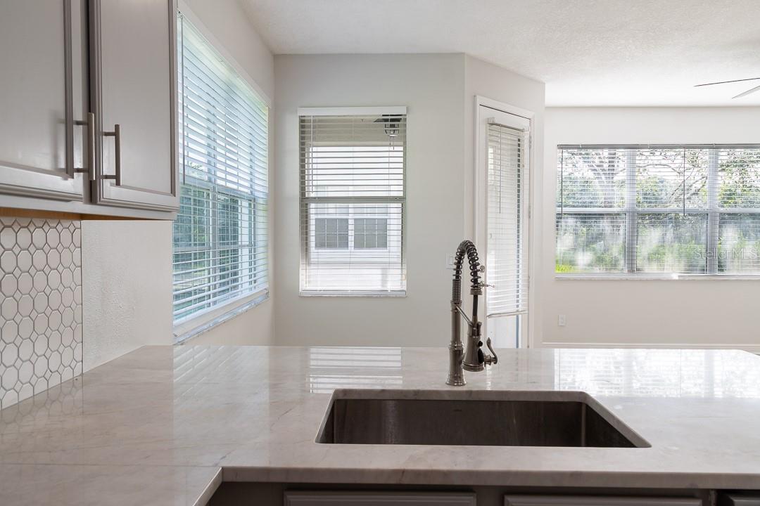Oversized sink with a full rack insert