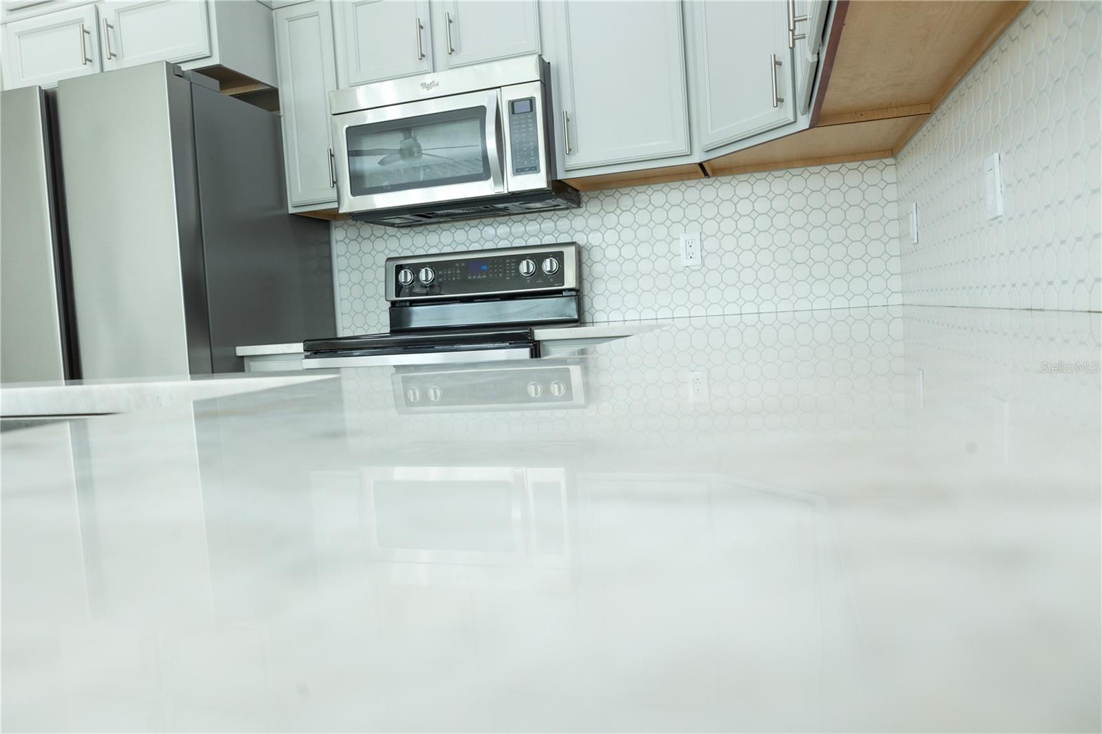 Marble Countertops with unique veining. Easy to maintain daily.