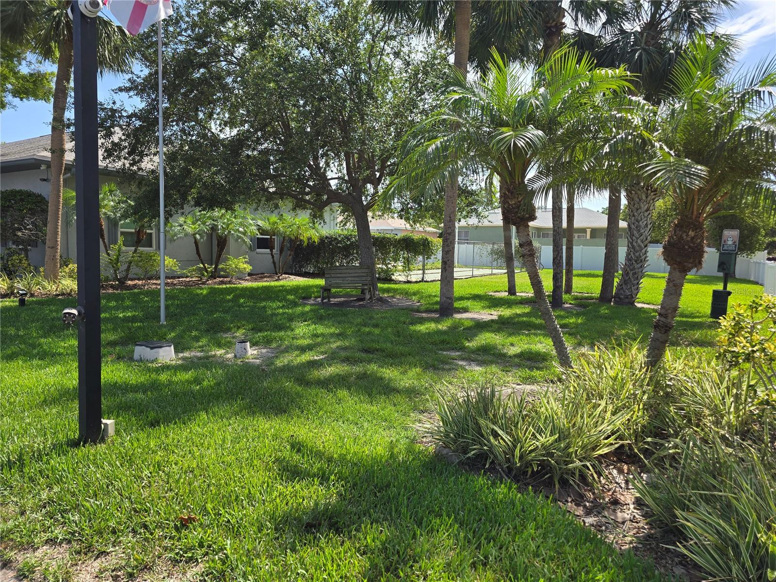 COMMUNITY GREEN SPACE AT SIDE OF CLUBHOUSE