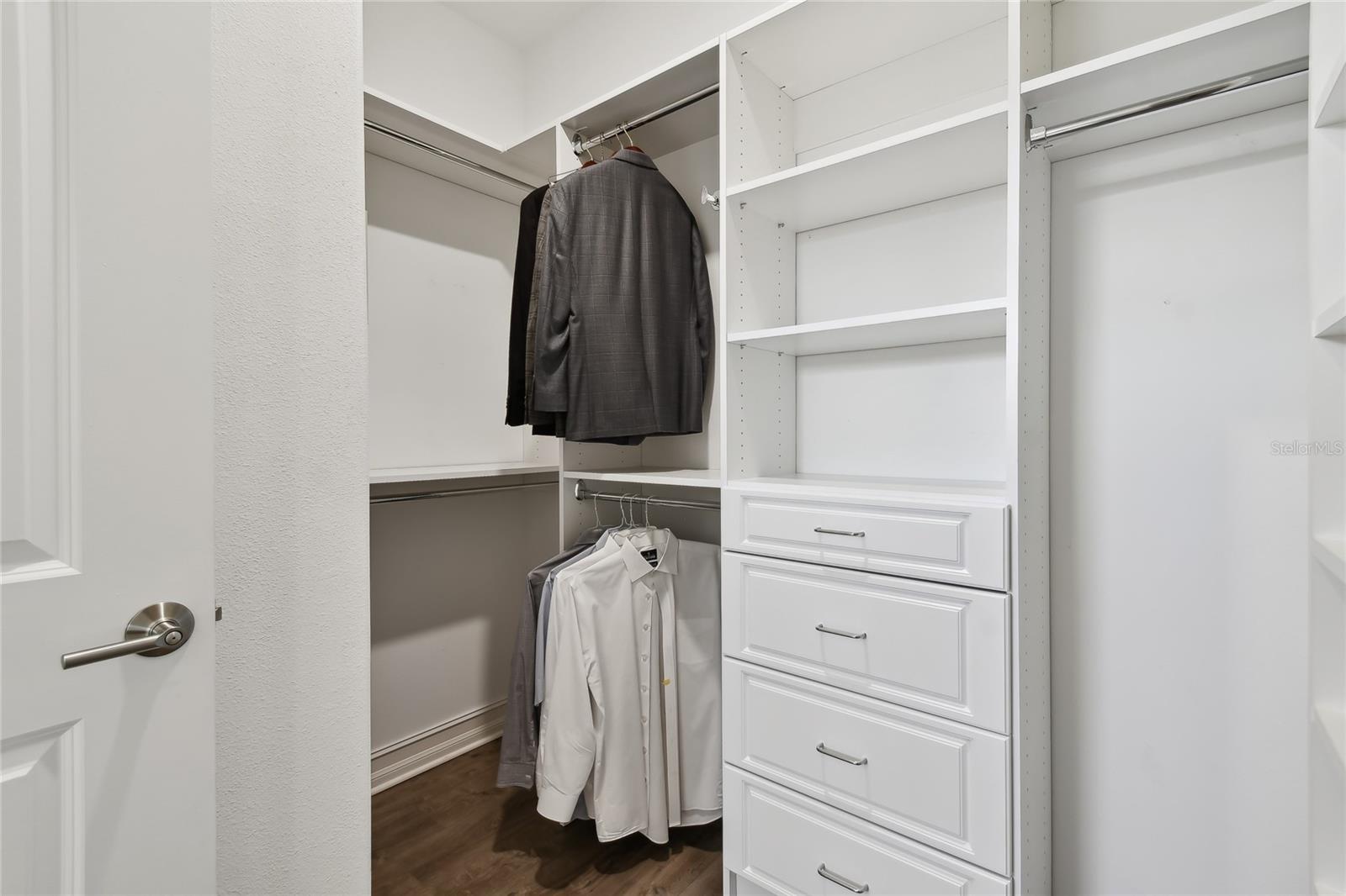 PRIMARY BEDROOM WALK-IN CLOSET CUSTOM SHELVING