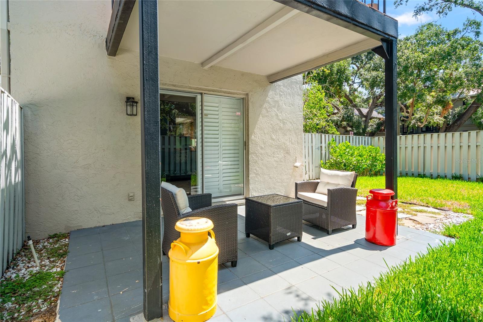 Rare ground floor condo with private back yard.
