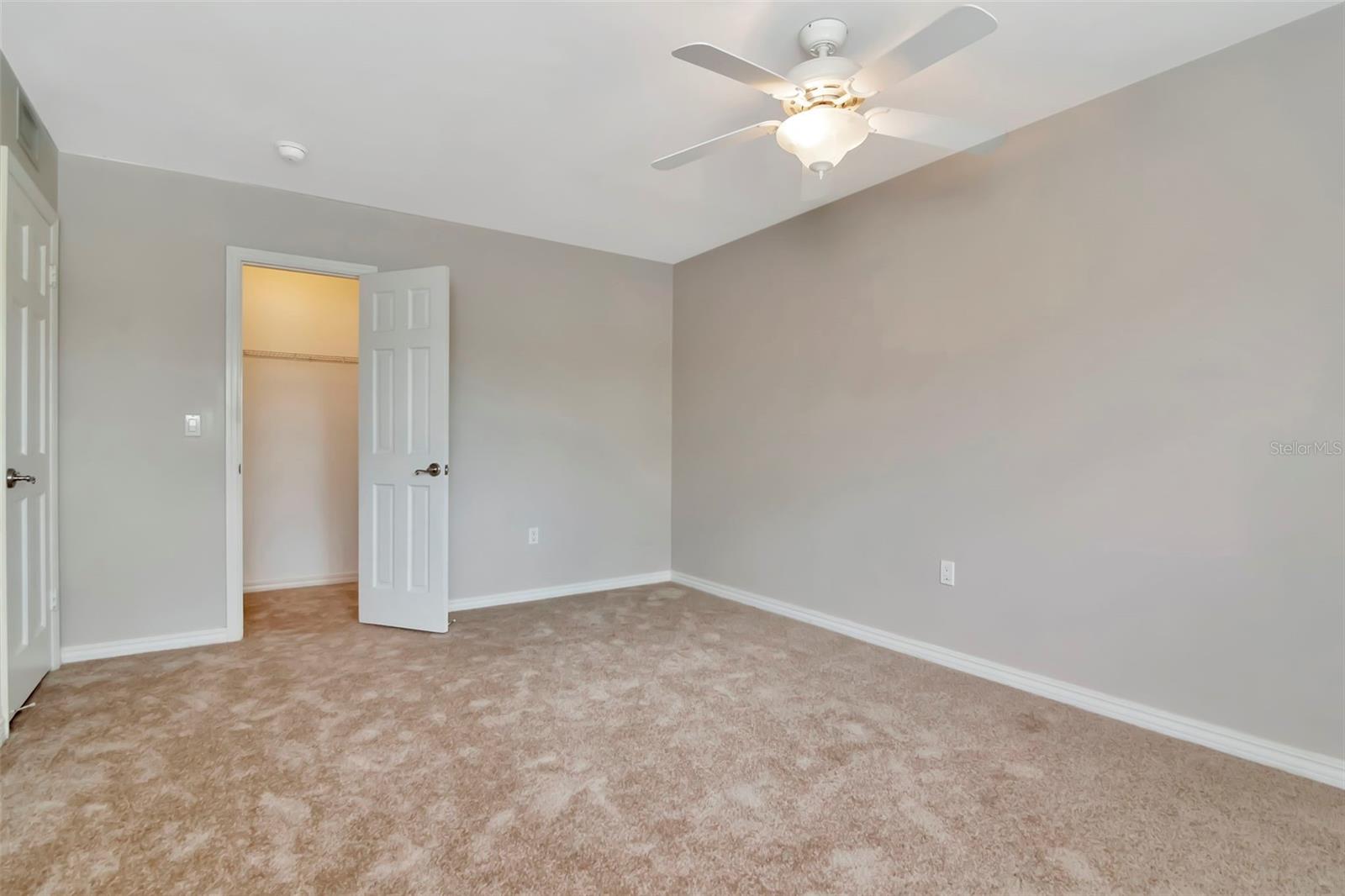 Primary with walk in closet and en-suite bath