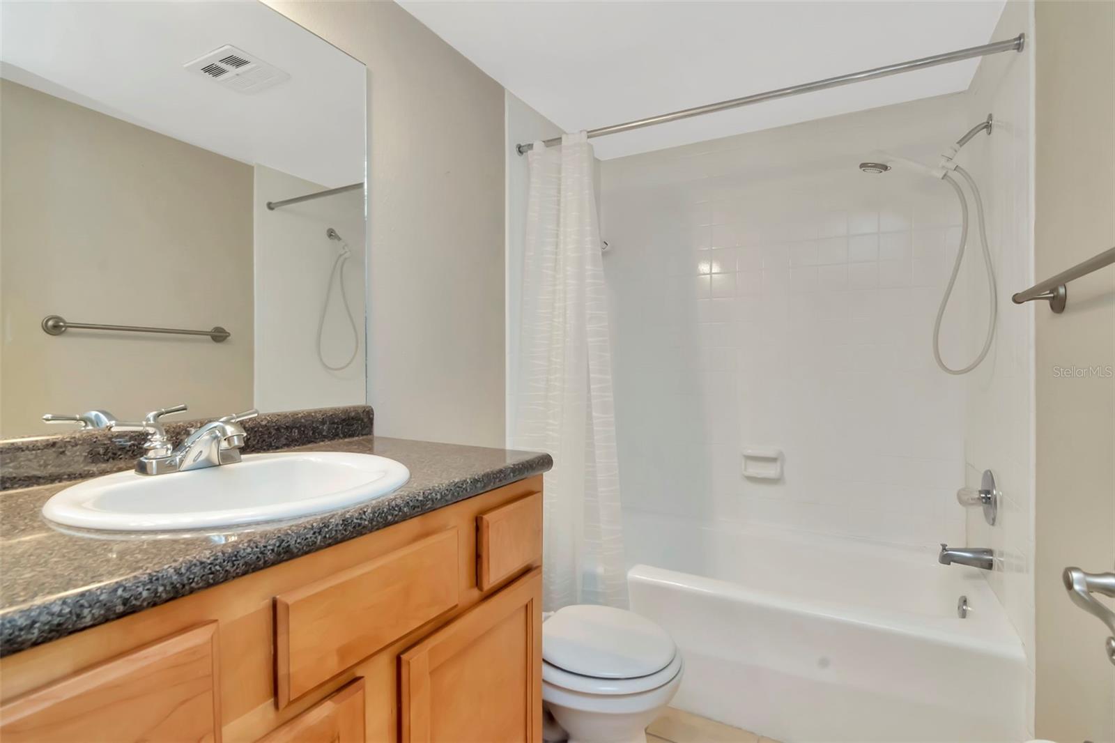 Guest/ 2nd bathroom with tub shower combo