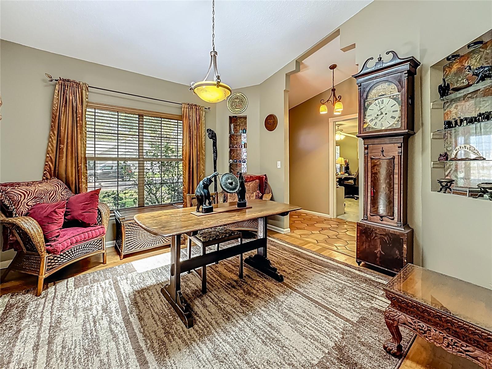 The breakfast bar is behind you, view into the dining room.