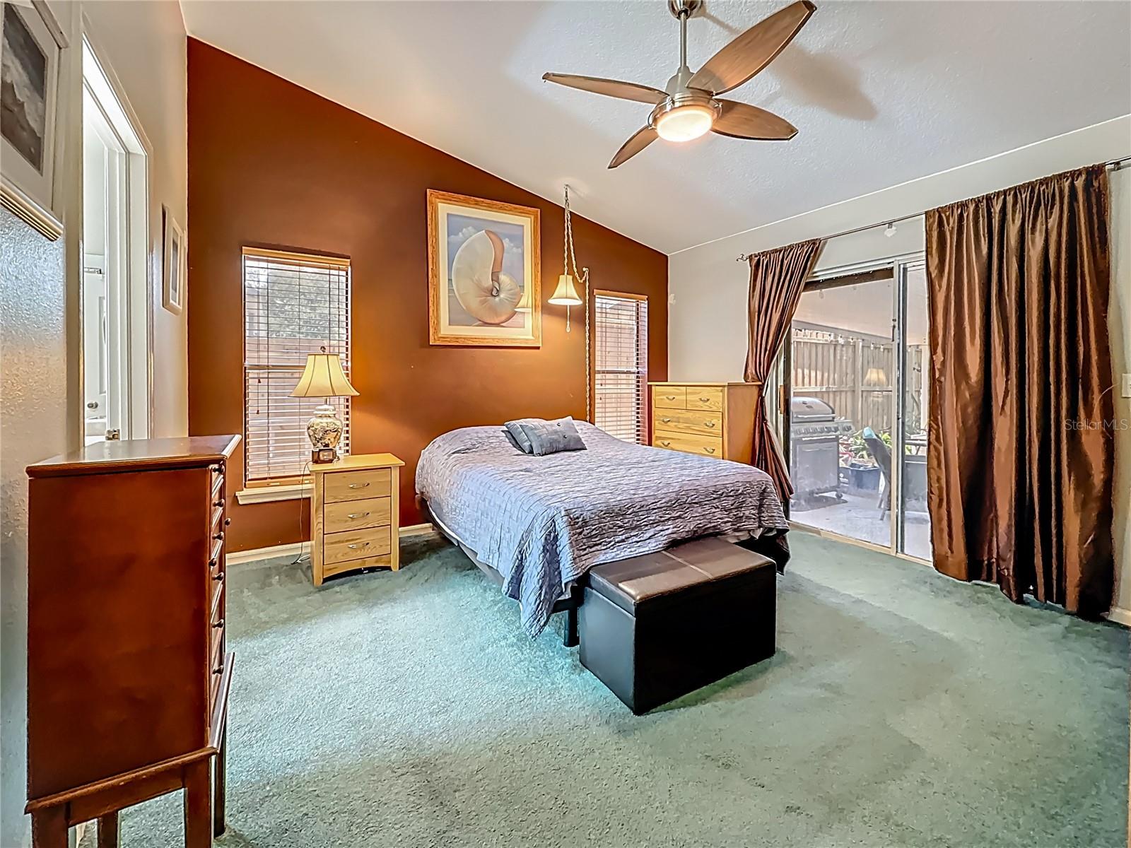 You are at the entrance to bedroom 3, with the doorway to the Jack n' Jill bath past this cabinet on your left. The walk-in closet is to your immediate left.