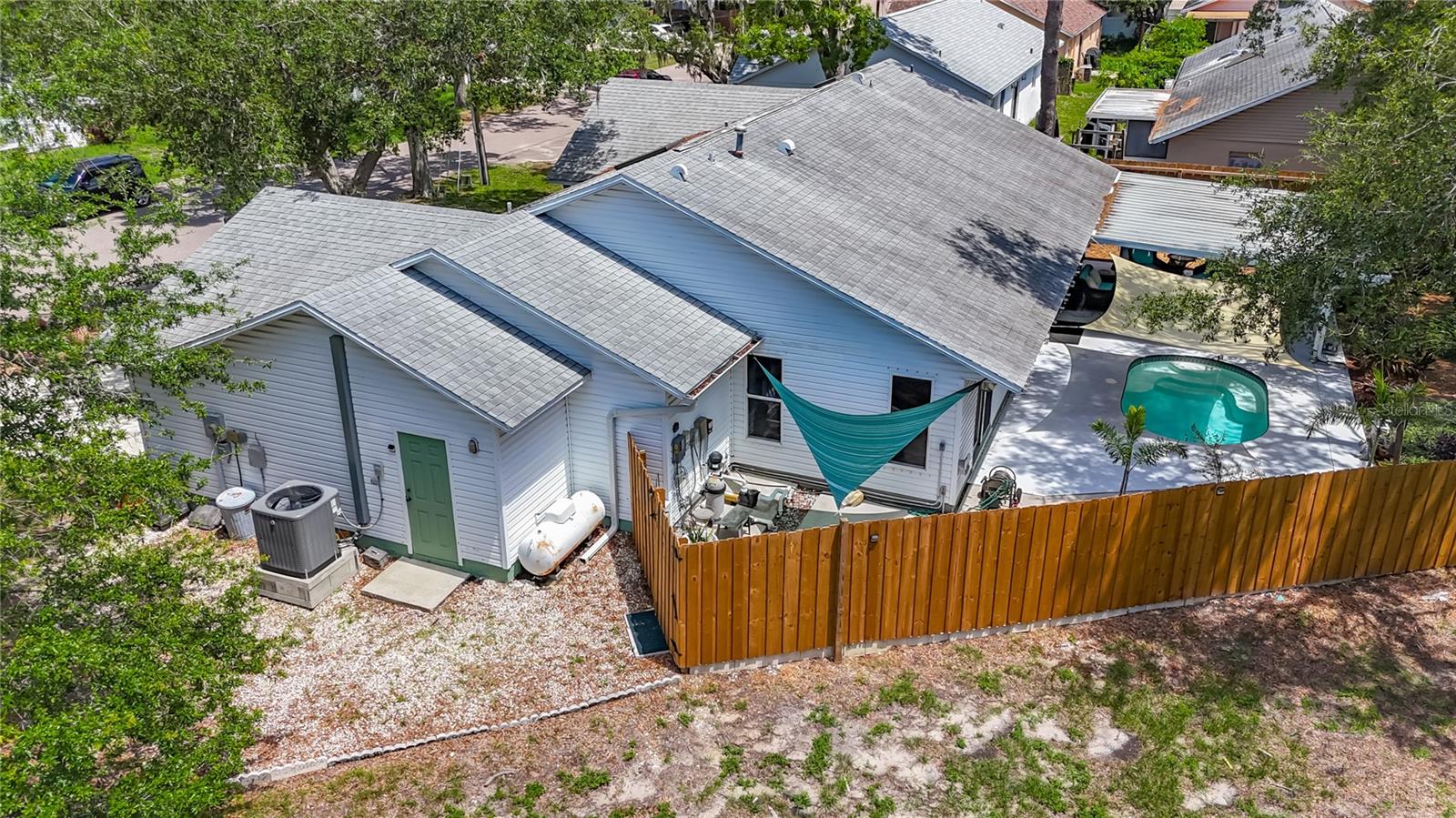 This  is a north west view. Notice the propane tank? 120 gallons & is used for the range and dryer. You could consider a generator, since the propane is already here. The HVAC was installed in 2020