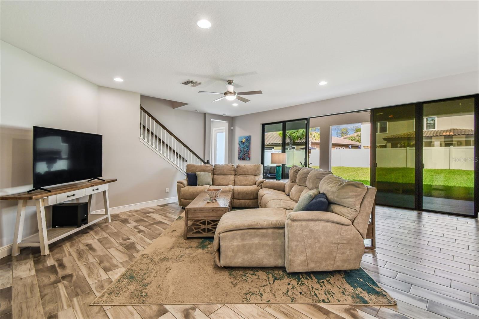 Living Room with Upgrade: Expanded Sliding Glass Doors with Screens & Solar Tint