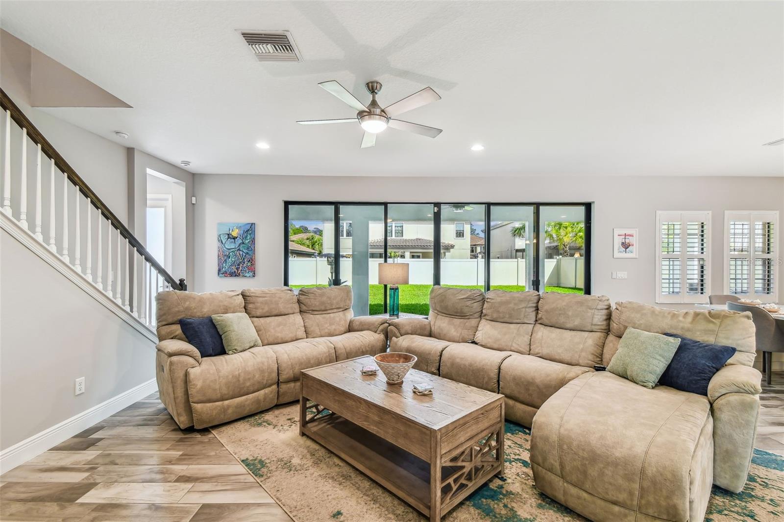 Living Room with Upgrade: Expanded Sliding Glass Doors with Screens & Solar Tint