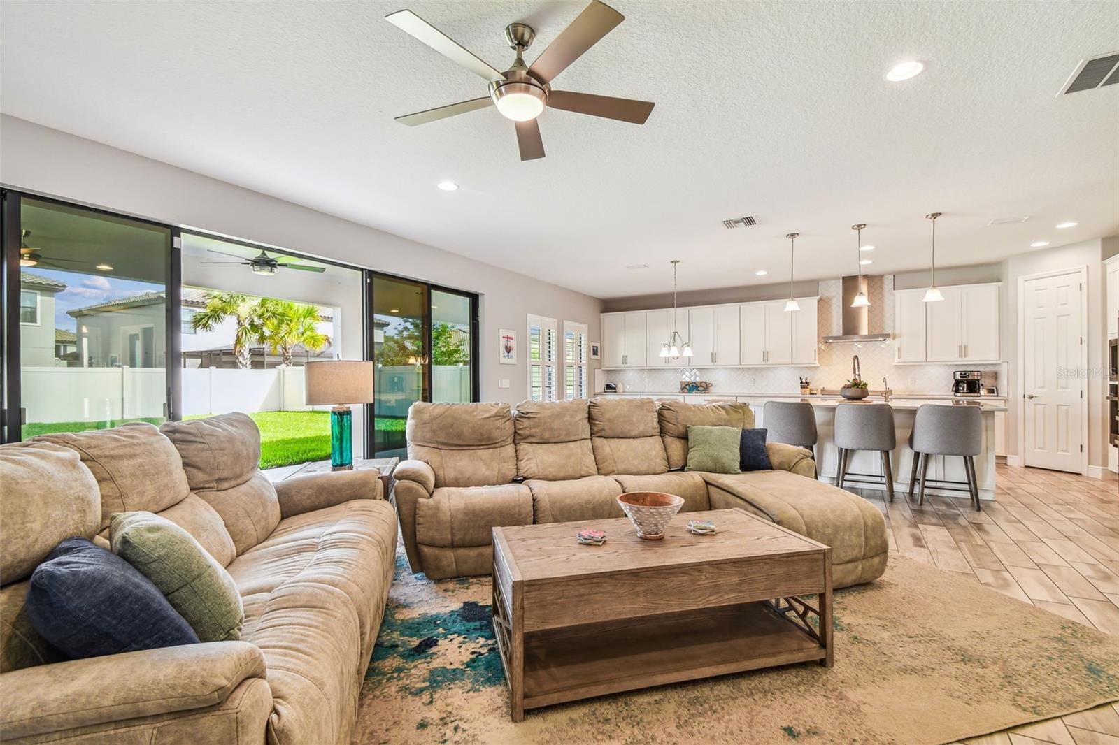 Living Room with Upgrade: Expanded Sliding Glass Doors with Screens & Solar Tint