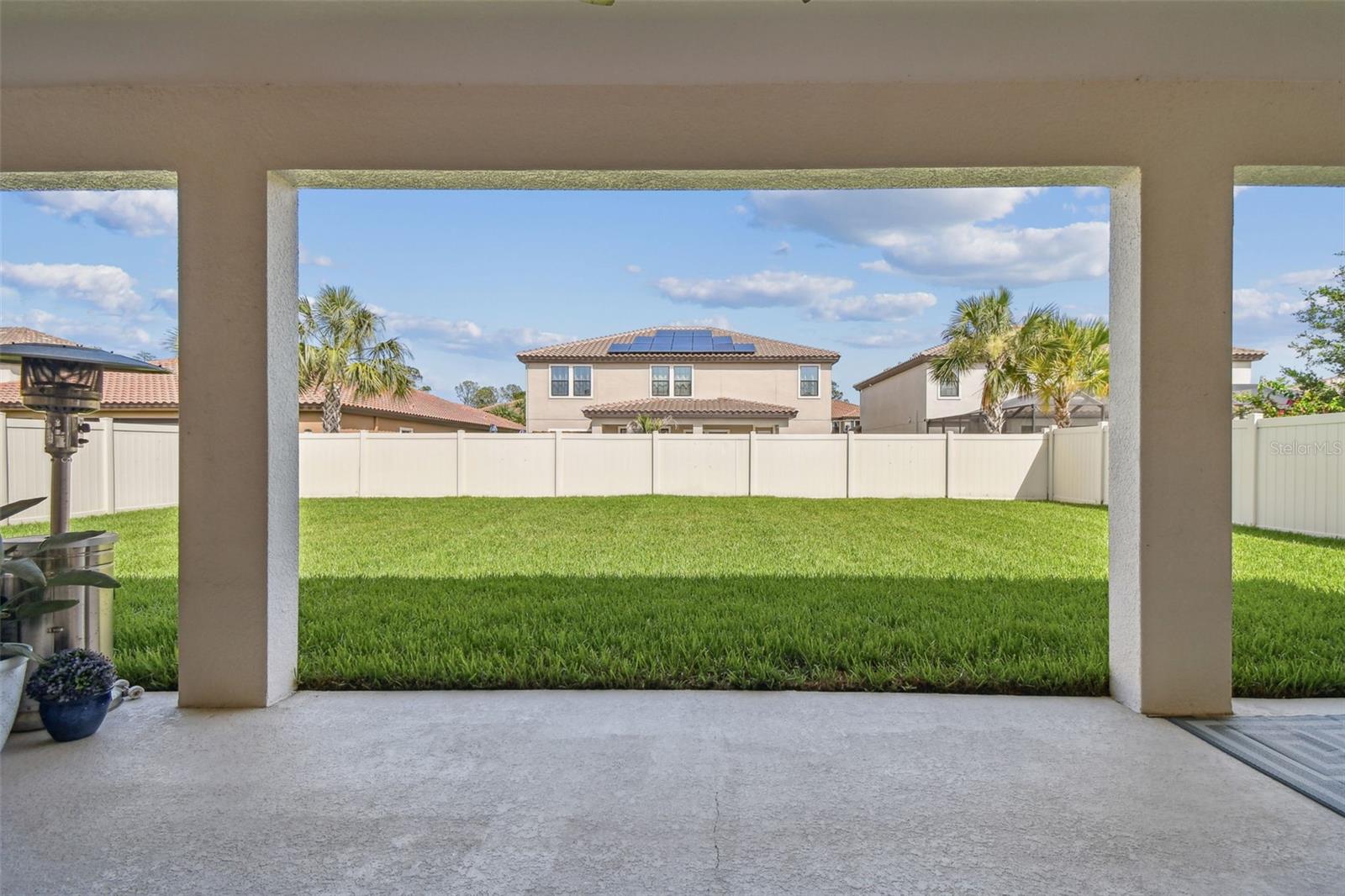 Expanded Lanai Views with a fenced in yard, big enough to add your own private swimming oasis!
