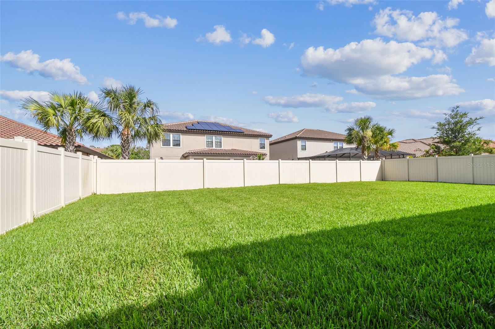 TREMENDOUS POOL-SIZED YARD with PRIVACY FENCE!